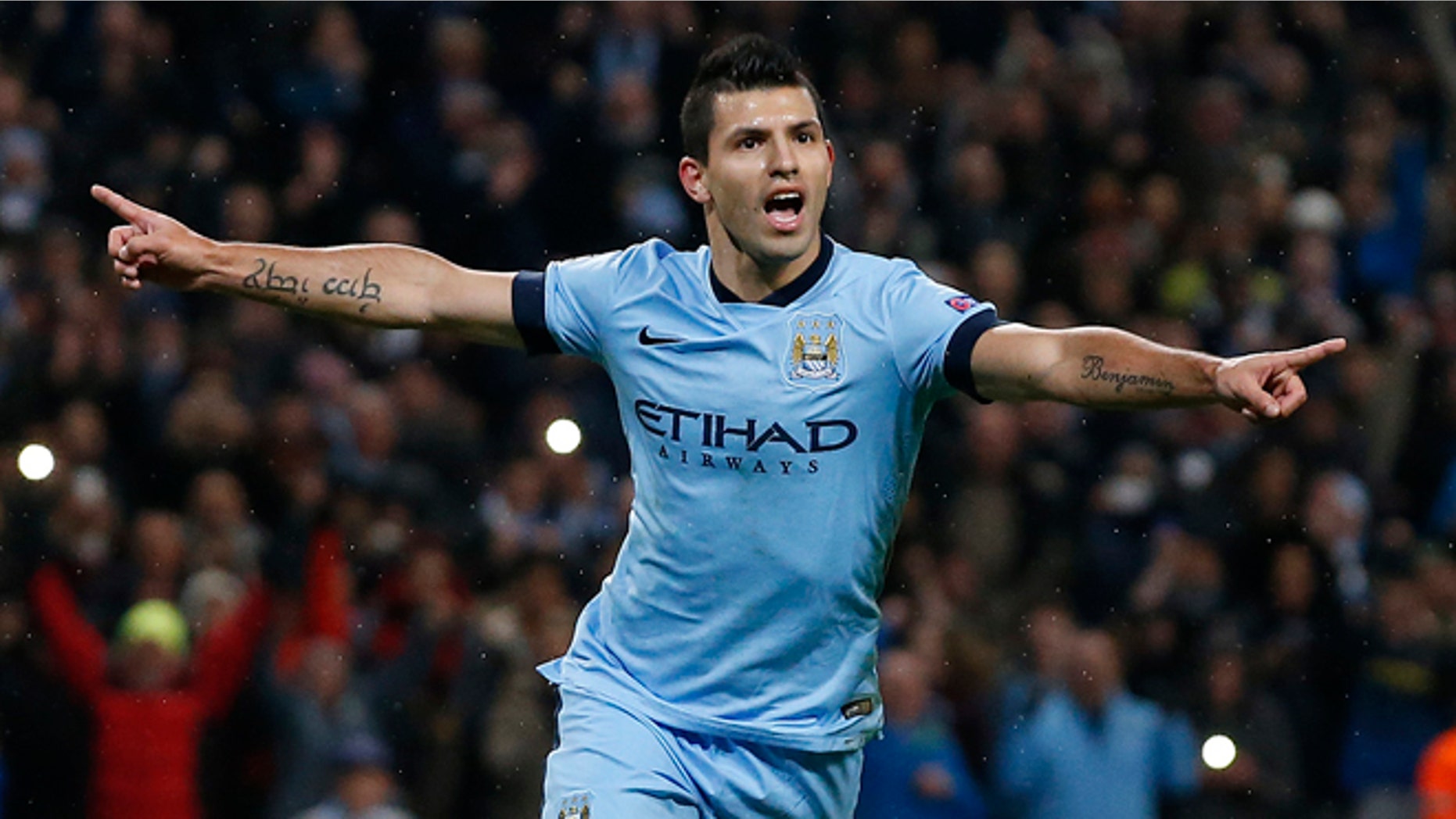 Manchester City's Sergio Aguero celebrates after scoring a penalty on Tuesday, Nov. 25, 2014.