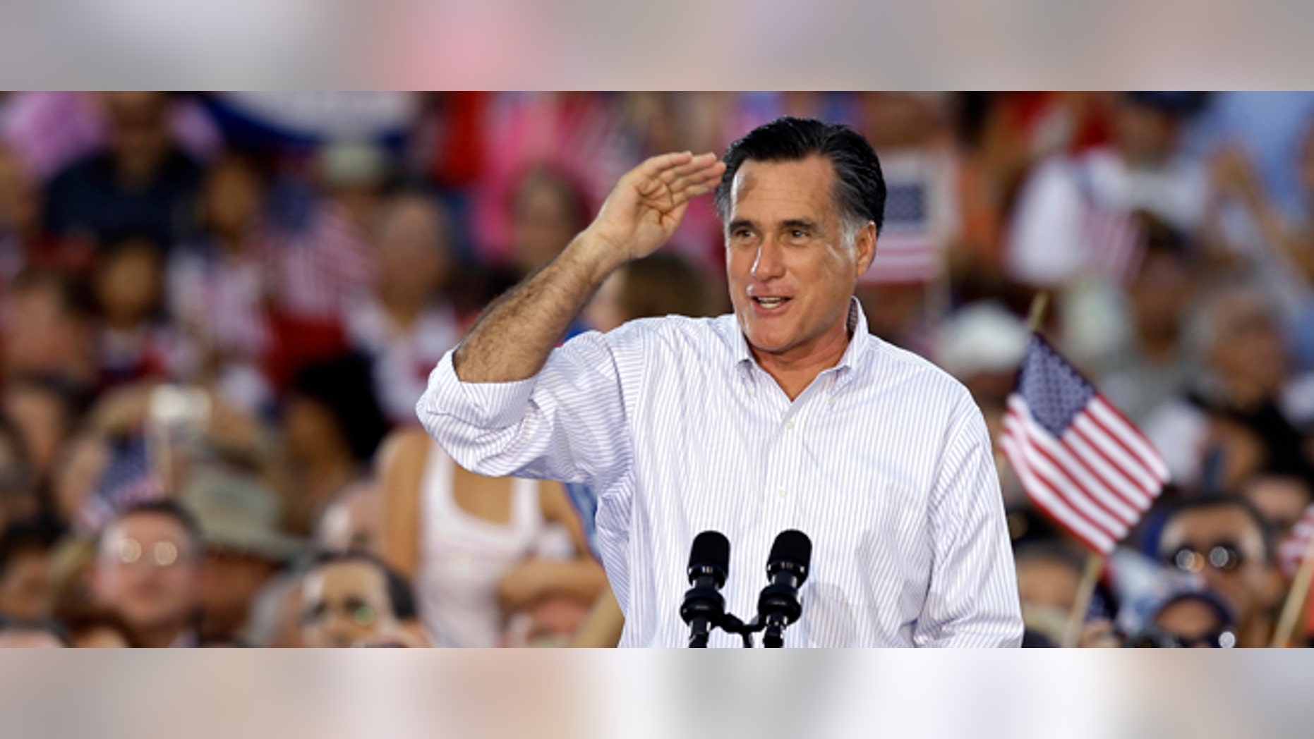 Republican Presidential candidate and former Massachusetts Gov. Mitt Romney salutes to the crowd during a campaign speech Friday, Oct. 5, 2012, in St. Petersburg, Fla. (AP Photo/Chris O'Meara)