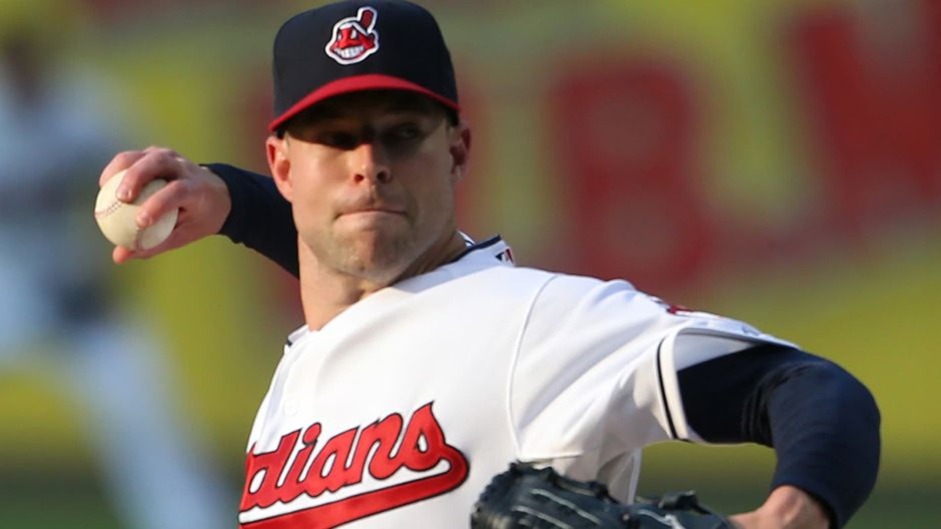 Cleveland Indians starting pitcher Corey Kluber pitches to Seattle Mariners' Austin Jackson during the first inning of a baseball game, Tuesday, June 9, 2015, in Cleveland. (AP Photo/Ron Schwane)