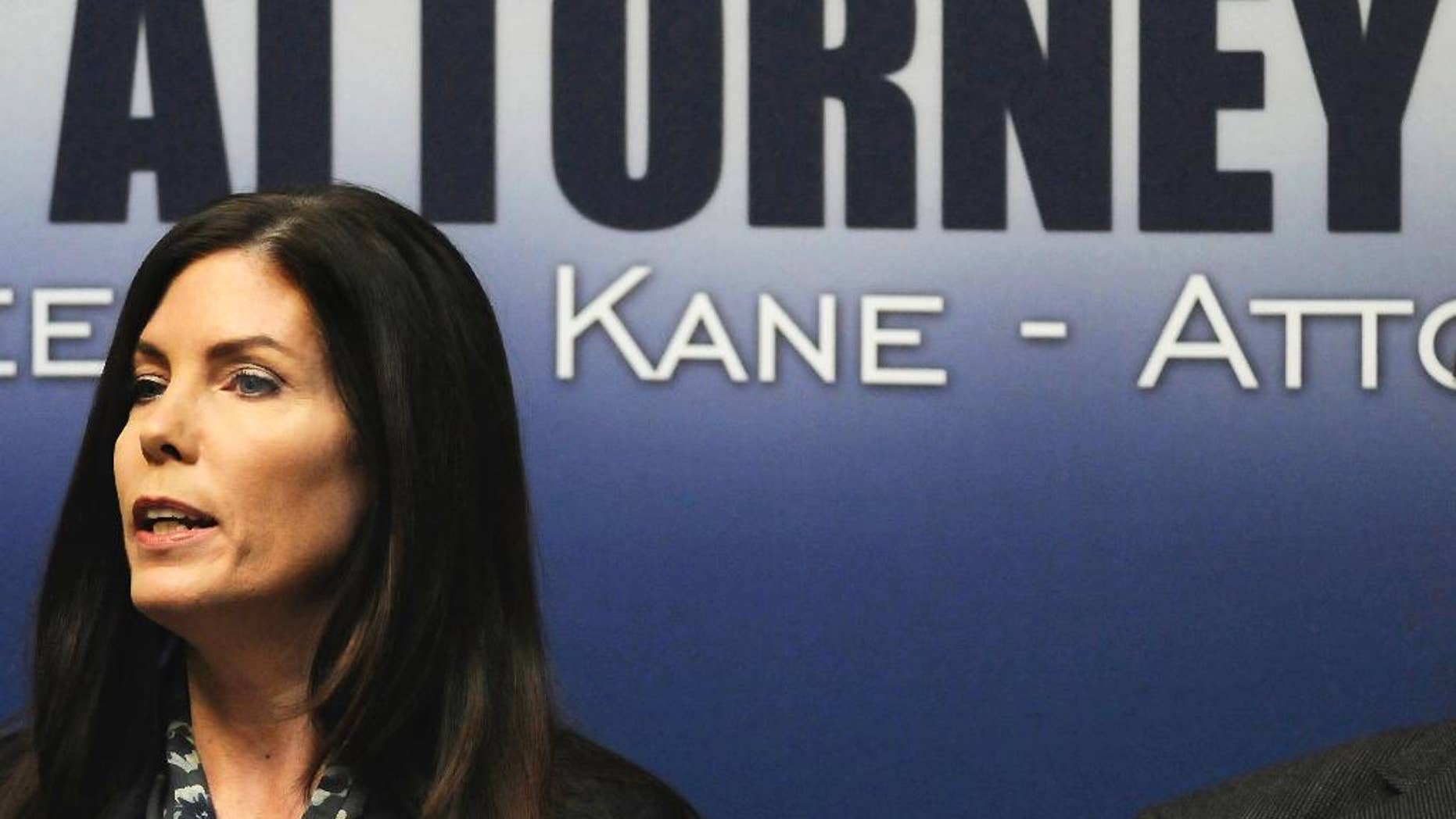 FILE - In this Feb. 13, 2015, file photo, Pennsylvania Attorney General Kathleen G. Kane speaks during a news conference in Scranton, Pa. Kane, the first woman and first Democrat elected attorney general in Pennsylvania, was charged Thursday, Aug. 6, 2015, with perjury, obstruction, abuse of office, conspiracy and false swearing. She is expected to surrender and be arraigned within two days. (Butch Comegys/The Times & Tribune via AP)