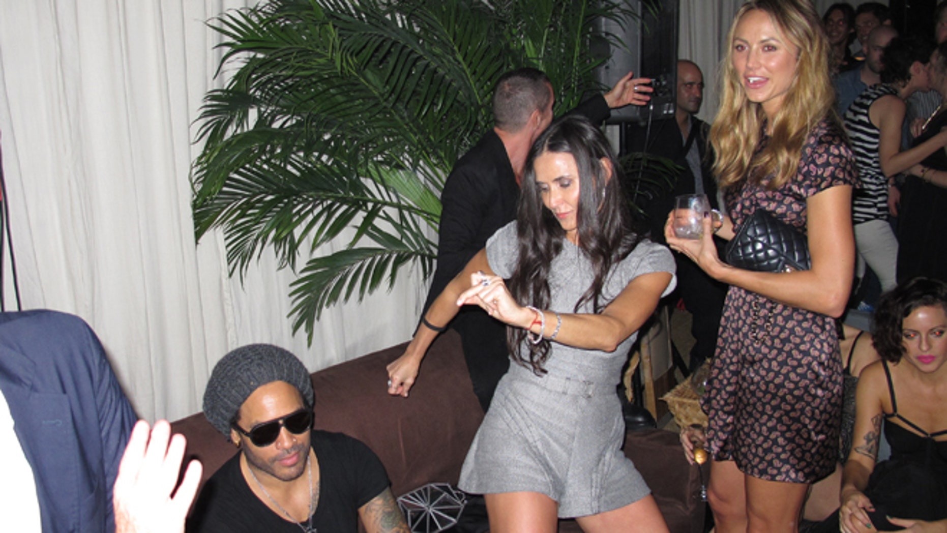  Demi  Moore  gets wild at Miami  party with new man Vito 