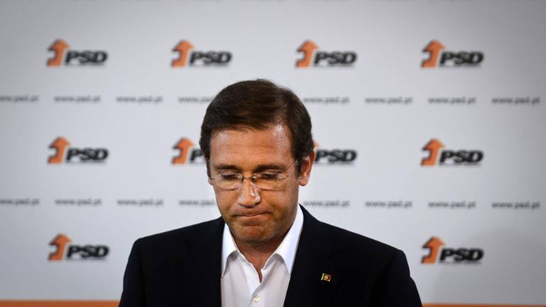 Portuguese Prime Minister Pedro Passos Coelho delivers a speech after the results of Portugal local elections in Lisbon, on September 29, 2013