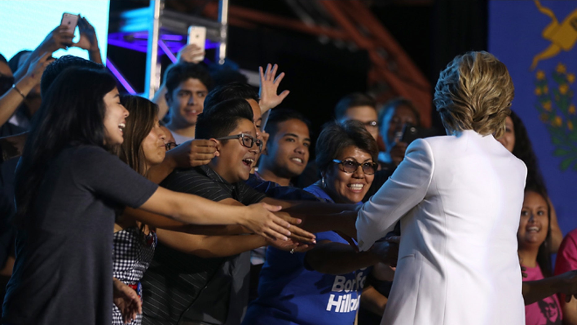 NORTH LAS VEGAS, NV - OCTOBER 19: Democratic presidential nominee Hillary Clinton greets supporters during a debate watch party at Craig Ranch Regional Park Amphitheater following the third U.S. presidential debate at UNLV on October 19, 2016 in North Las Vegas, Nevada. Tonight was the final debate ahead of Election Day on November 8. (Photo by Justin Sullivan/Getty Images)