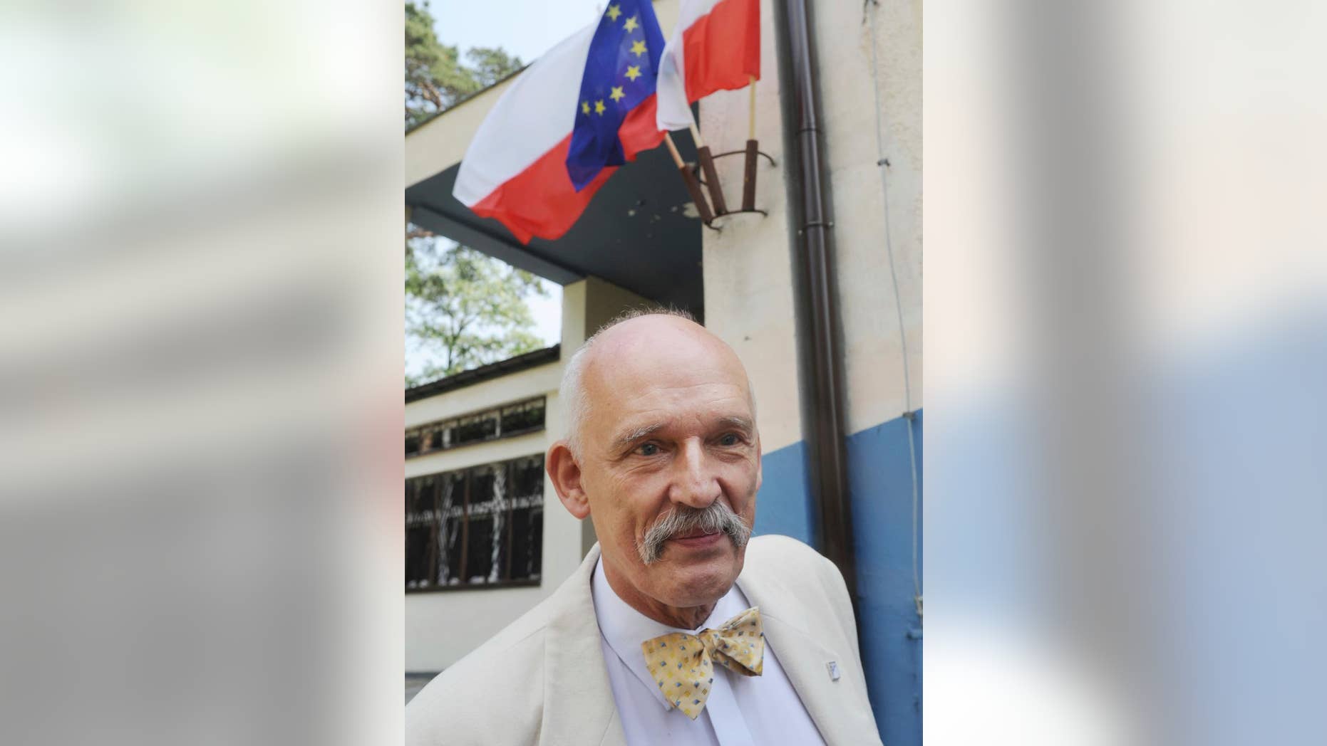 FILE-In this May 25, 2014 file photo, Janusz Korwin-Mikke, leader of a small far right and eurosceptic party leaves a polling station after voting in the European Parliament elections near Warsaw, Poland. Chosen a European lawmaker, he has repeatedly made comments that have outraged other lawmakers. The president of the EU parliament opened an investigation Thursday, March 2, 2017 into his comments that "women must earn less than men because they are weaker, they are smaller, they are less intelligent." He can be reprimanded fined or temporarily suspended for such comments. He recently said in Warsaw that it is a "20th-century stereotype that women have the same intellectual potential as men." (AP Photo/Alik Keplicz)