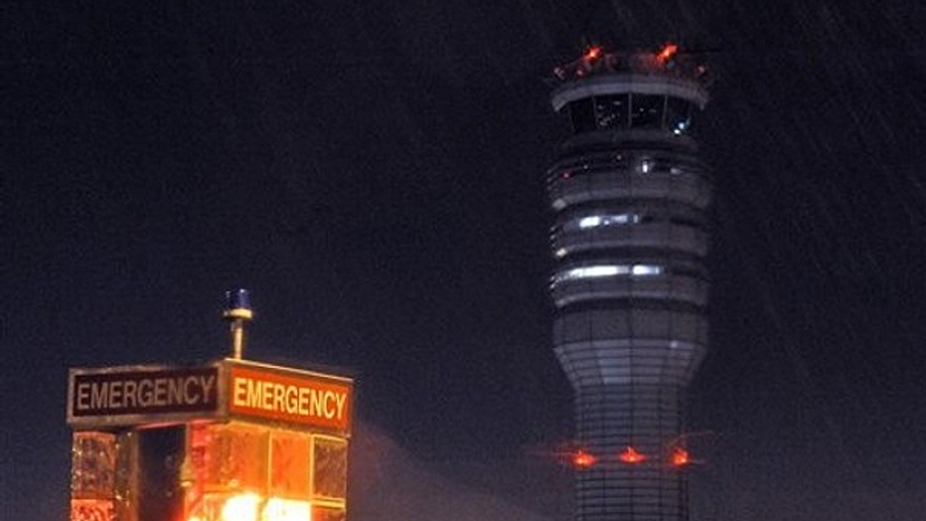 March 23: The FAA control tower at Reagan National Airport is seen during a storm, in Arlington, Va.
