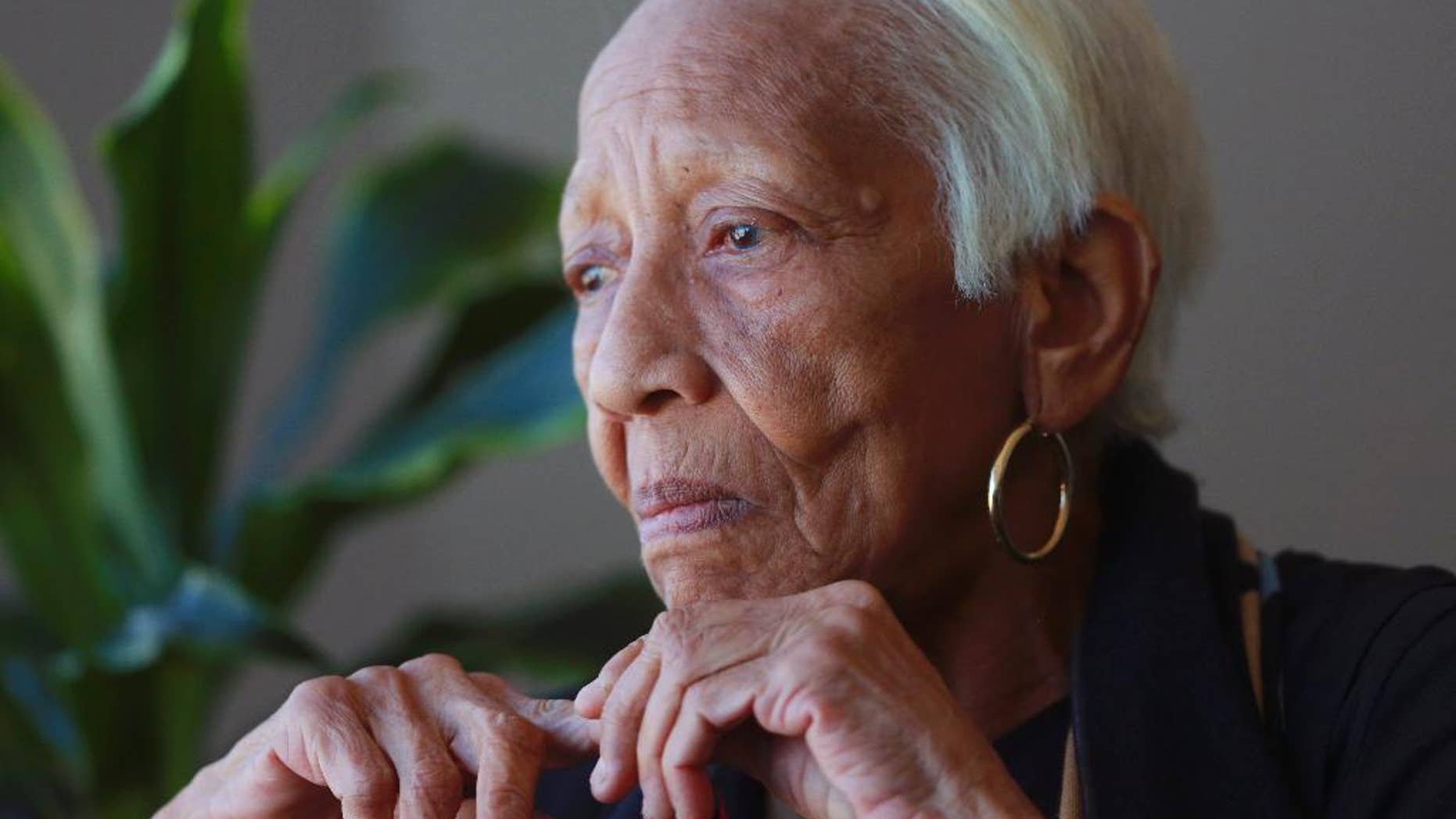 FILE - In this Jan. 11, 2016, file photo, Doris Payne speaks during an interview in Atlanta. Payne, a noted jewel thief who discussed her six-decade criminal career in a documentary has been arrested after authorities said she failed to appear in court. The DeKalb County Sheriff’s Office says Payne was arrested at her Atlanta home on Monday, March 13, 2017. (AP Photo/John Bazemore, File)