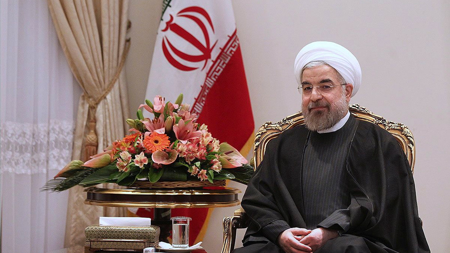 In this photo released by the official website of the office of the Iranian Presidency, President Hassan Rouhani sits in a meeting with Swedish Foreign Minister Carl Bildt at the Presidency compound in Tehran, Iran, Tuesday, Feb. 4, 2014. Iran's official IRNA news agency quoted President Hassan Rouhani as saying his country is ready for final nuclear talks with world powers. The Tuesday remarks came during a meeting with visiting Swedish Minister for Foreign Affairs Carl Bildt. (AP Photo/Presidency Office, Mohammad Berno)