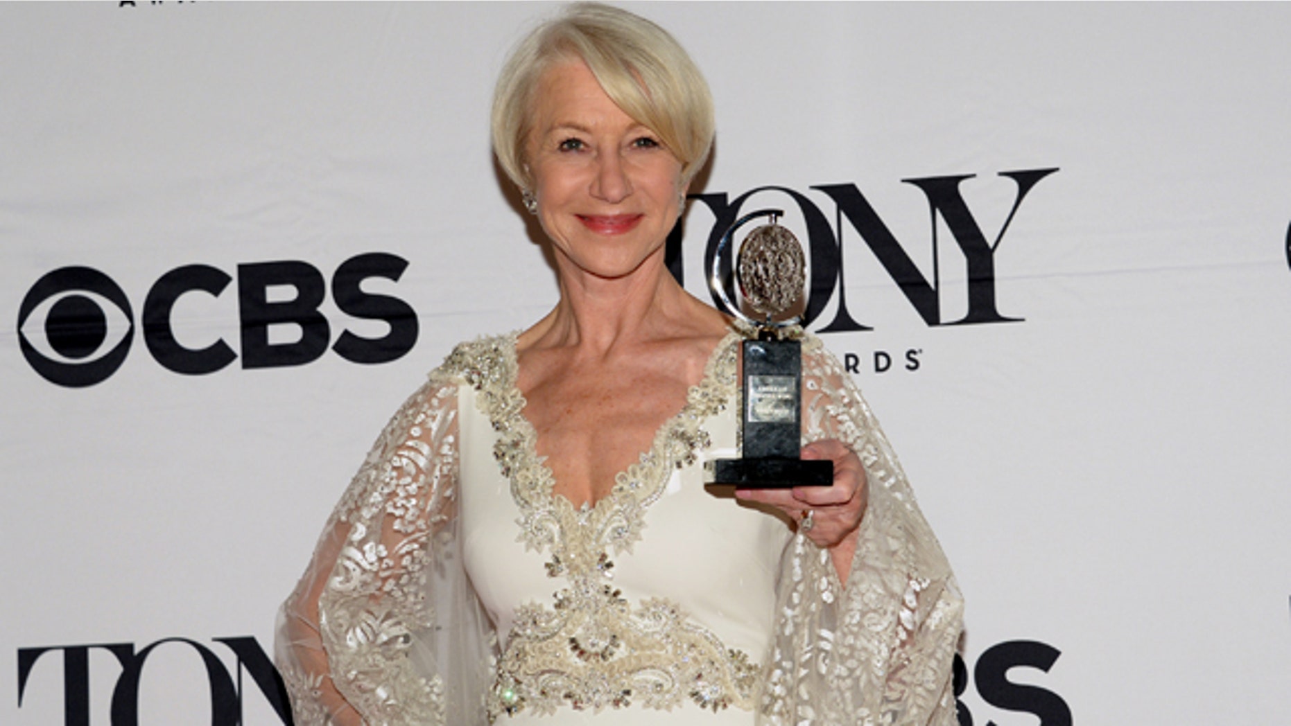 June 7, 2015: Helen Mirren poses in the press room with the award for best performance by an actress in a leading role in a play for The Audience at the 69th annual Tony Awards in New York. (Photo by Evan Agostini/Invision/AP)