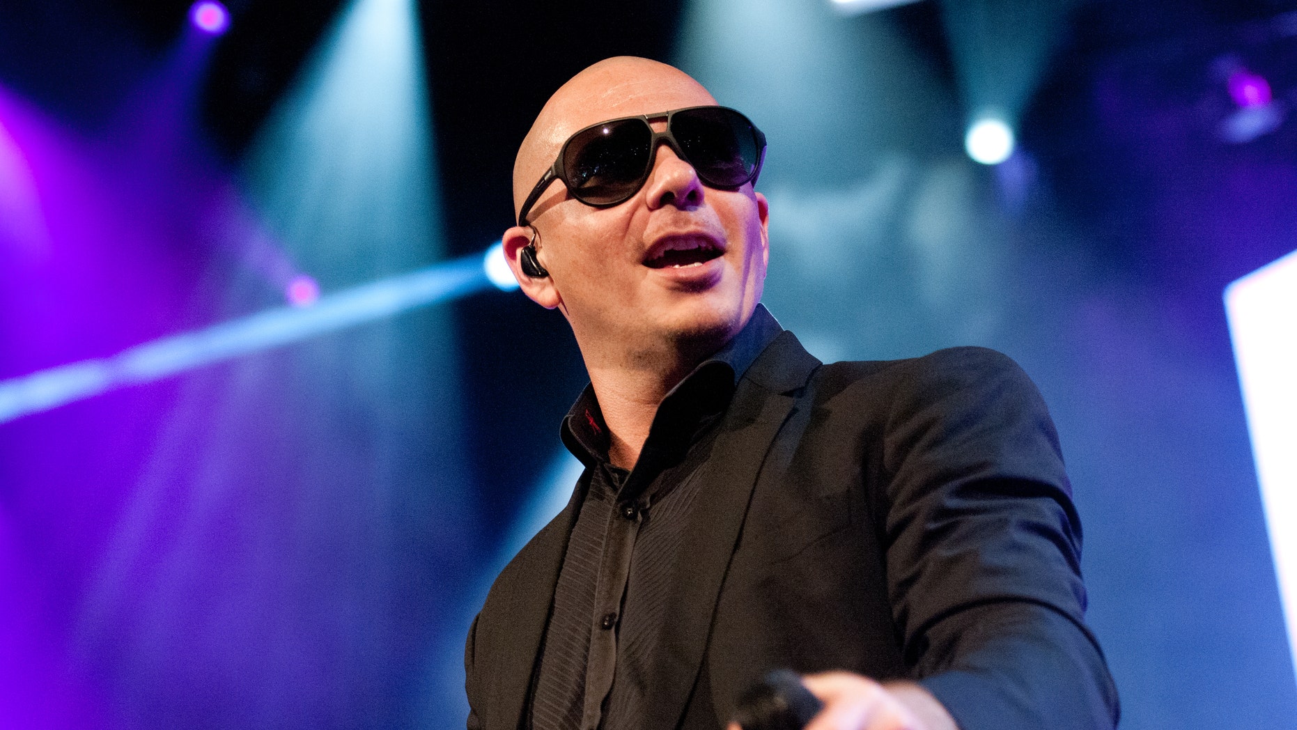 Pitbull performs at the Barclays Center on December 26, 2013 in New York City.