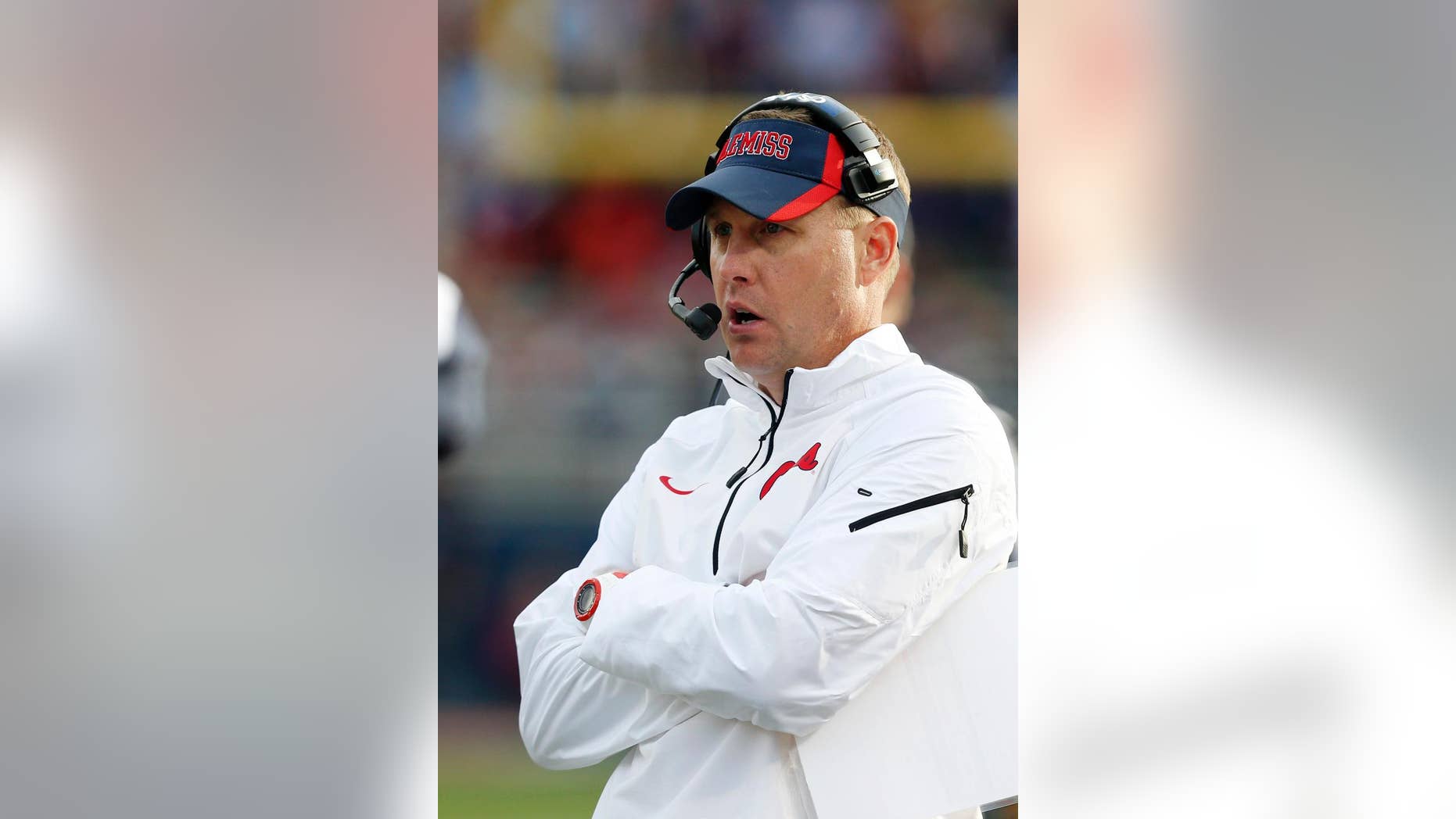 Mississippi coach Hugh Freeze watches during the second half of an NCAA college football game against Alabama in Oxford, Miss., Saturday, Oct. 4, 2014. Mississippi won 23-17. (AP Photo/Rogelio V. Solis)