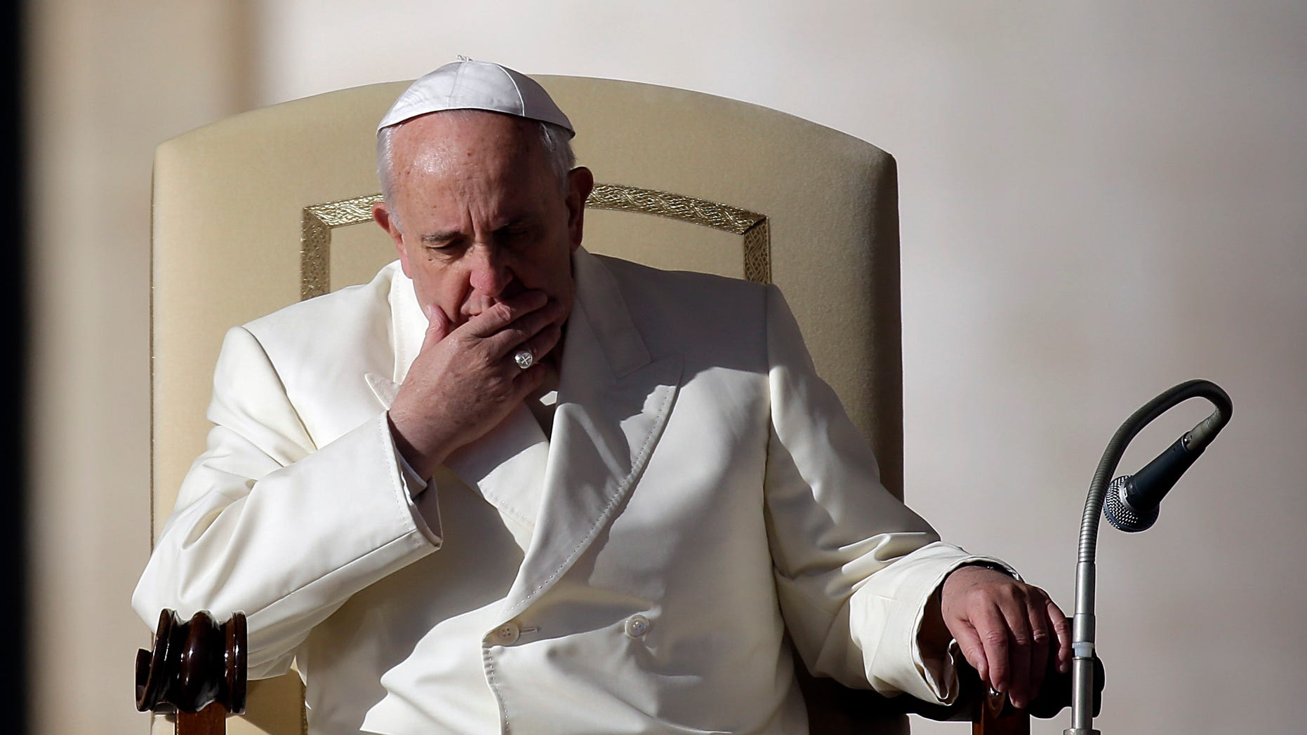 Pope Francis attends his weekly general audience in St. Peter's Square at the Vatican, Wednesday, Dec. 4, 2013. (AP Photo/Gregorio Borgia)
