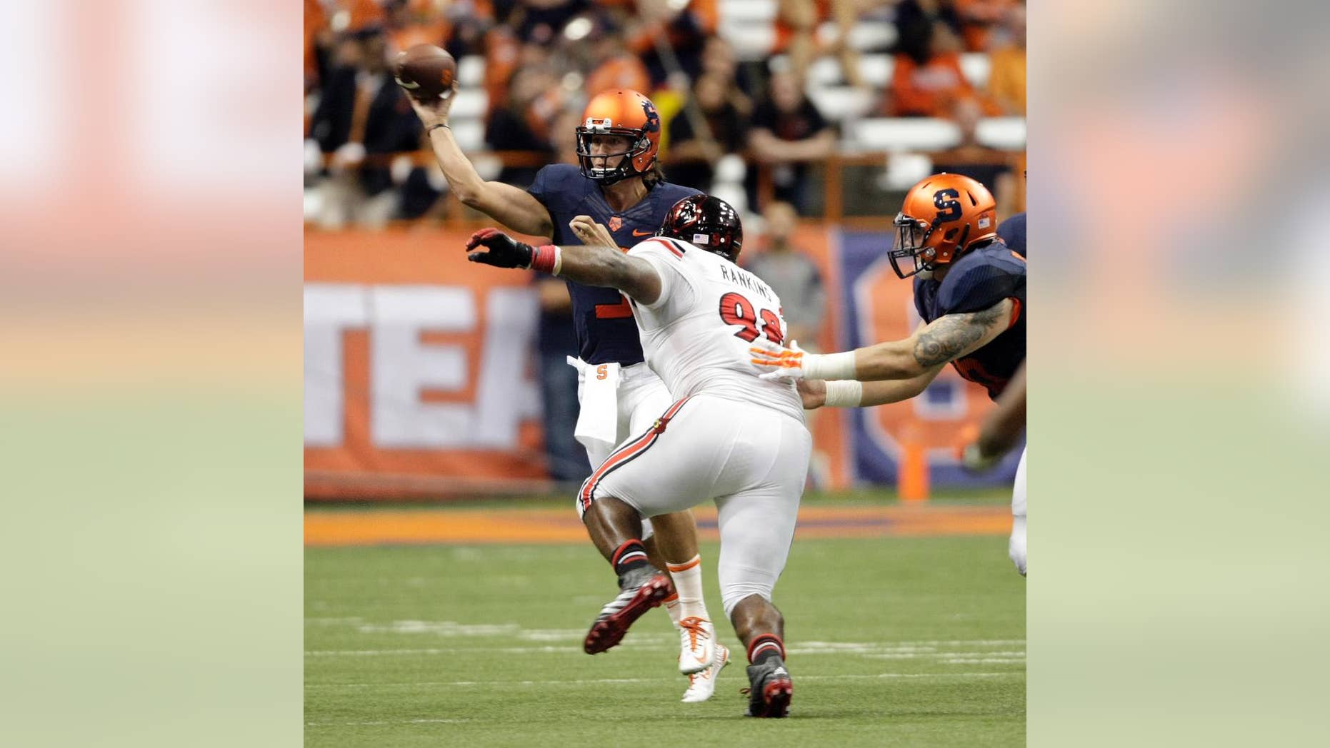 Syracuse’s Austin Wilson throws a pass in third quarter of an NCAA college football game against Louisville in Syracuse, N.Y., Friday, Oct. 3, 2014. Wilson replaced starting quarterback Terrel Hunt who was injured and left the game. Louisville won 28-6. (AP Photo/Nick Lisi)
