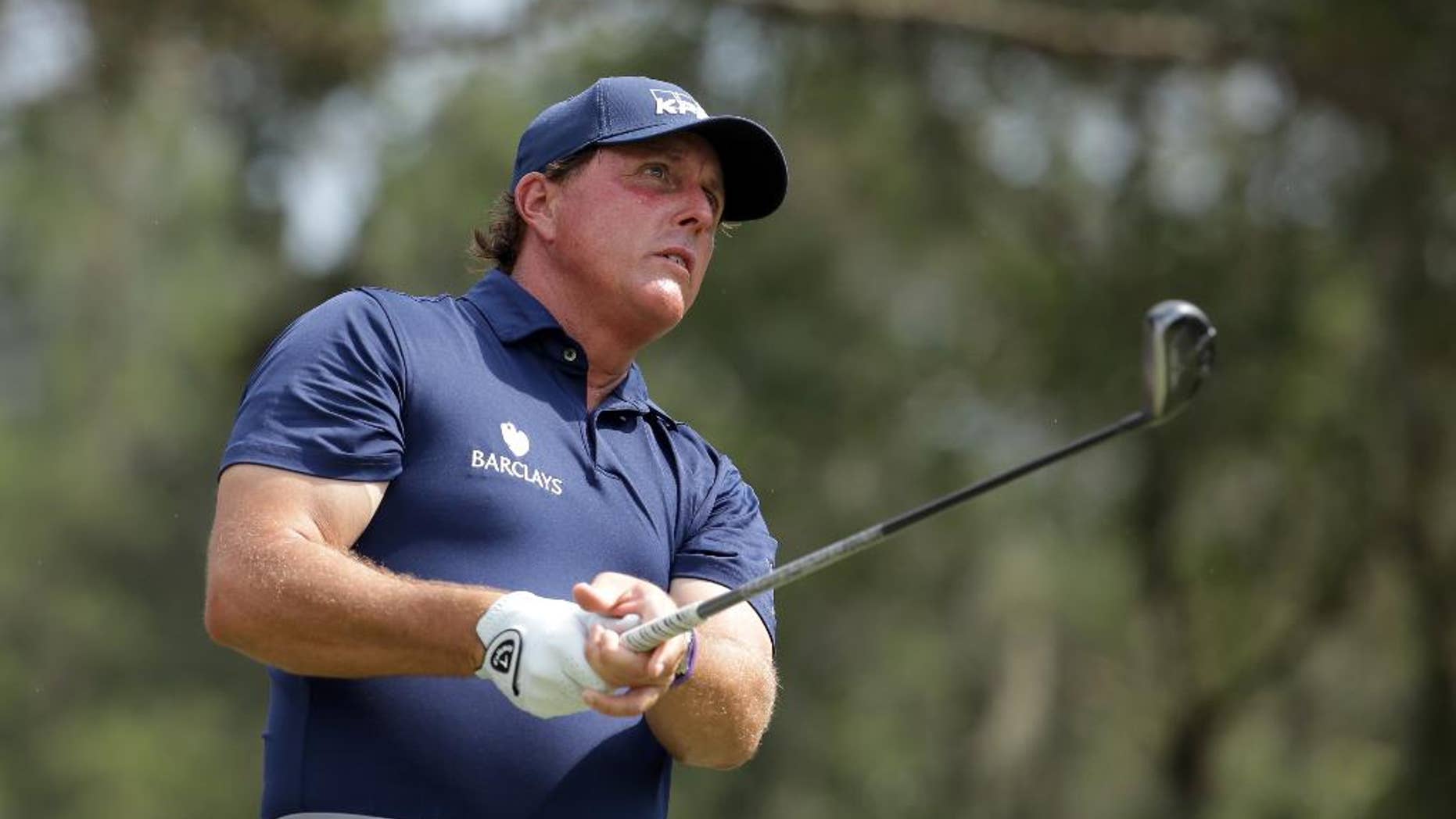 Phil Mickelson looks on during the second round of The Players Championship on May 13.