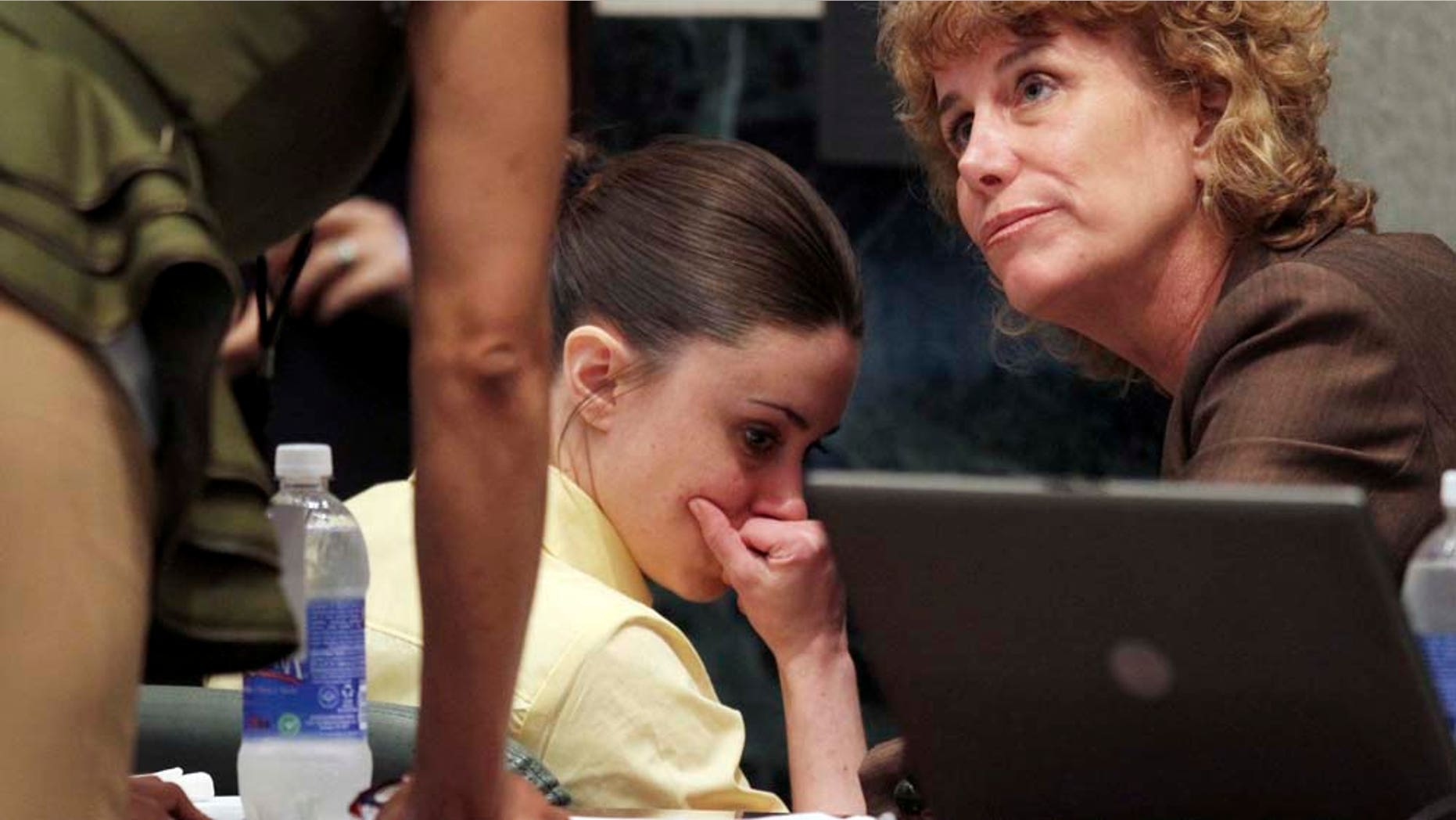 Casey Anthony, with her attorney Dorothy Clay Sims, is seen during a court recess following the state's closing arguments in her murder trial in Orlando, Fla.