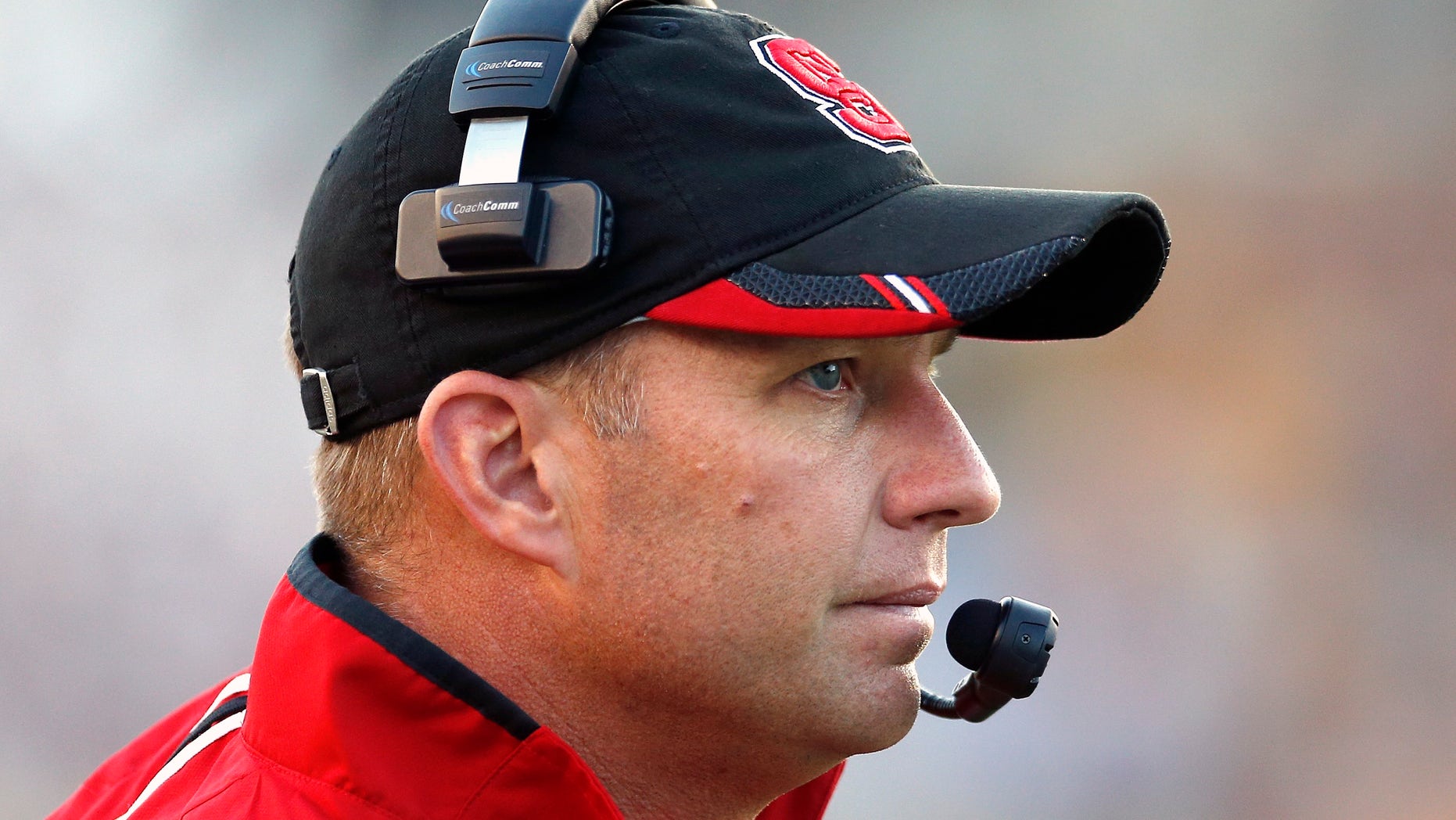 North Carolina State head coach Dave Doeren watches from the sideline in the fourth quarter of an NCAA college football game against Boston College in Boston, Saturday, Nov. 16, 2013. Boston College won 38-21. (AP Photo/Michael Dwyer)