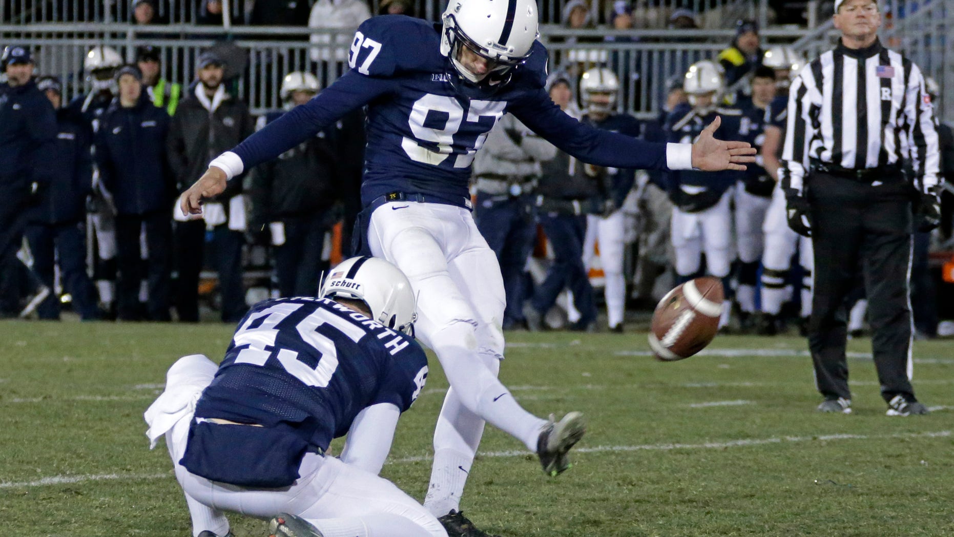 Penn State kicker Sam Ficken (97) misses on a field goal attempt in overtime during an NCAA college football game against Nebraska in State College, Pa., Saturday, Nov. 23, 2013. Nebraska won in overtime 23-20. (AP Photo/Gene J. Puskar)