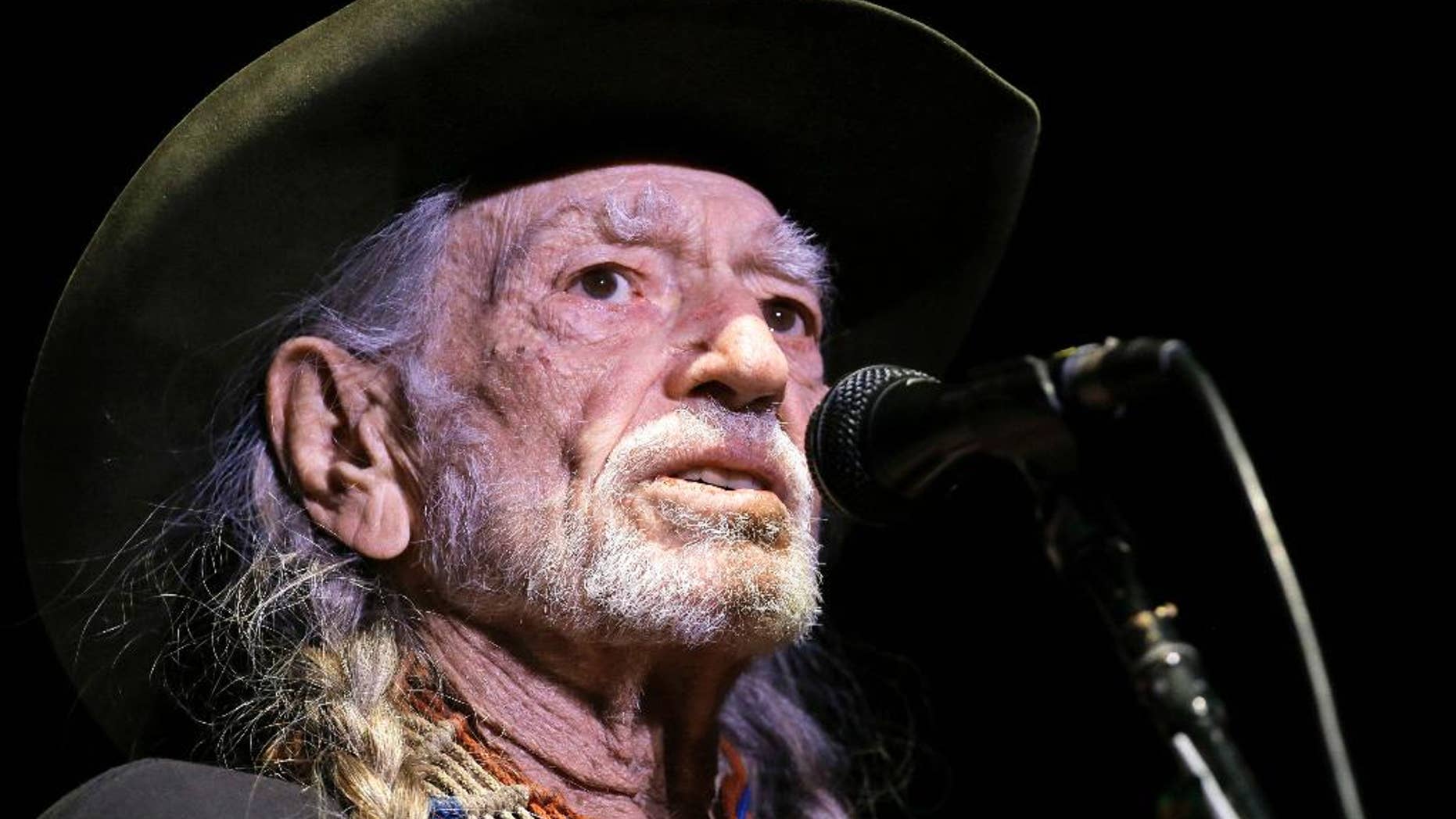 FILE - In this Jan. 7, 2017, file photo, Willie Nelson performs in Nashville, Tenn. Nelson's latest album, "God’s Problem Child," will be released on Friday, April 28. (AP Photo/Mark Humphrey, File)
