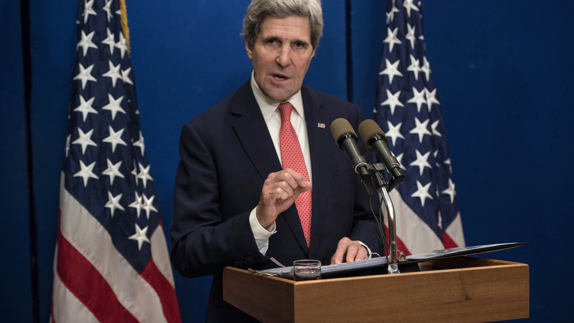 U.S. Secretary of State John Kerry speaks during a press conference at the David Citadel Hotel in Jerusalem on Sunday, Jan. 5, 2014. Kerry is heading to Jordan and Saudi Arabia to discuss his effort to broker peace between Israel and the Palestinians, yet his conversations with the U.S. allies will undoubtedly turn to other Mideast trouble spots. Kerry said Saturday that progress is being made in the Israeli-Palestinian talks, yet key hurdles are yet to be overcome. (AP Photo/Brendan Smialowski, Pool)