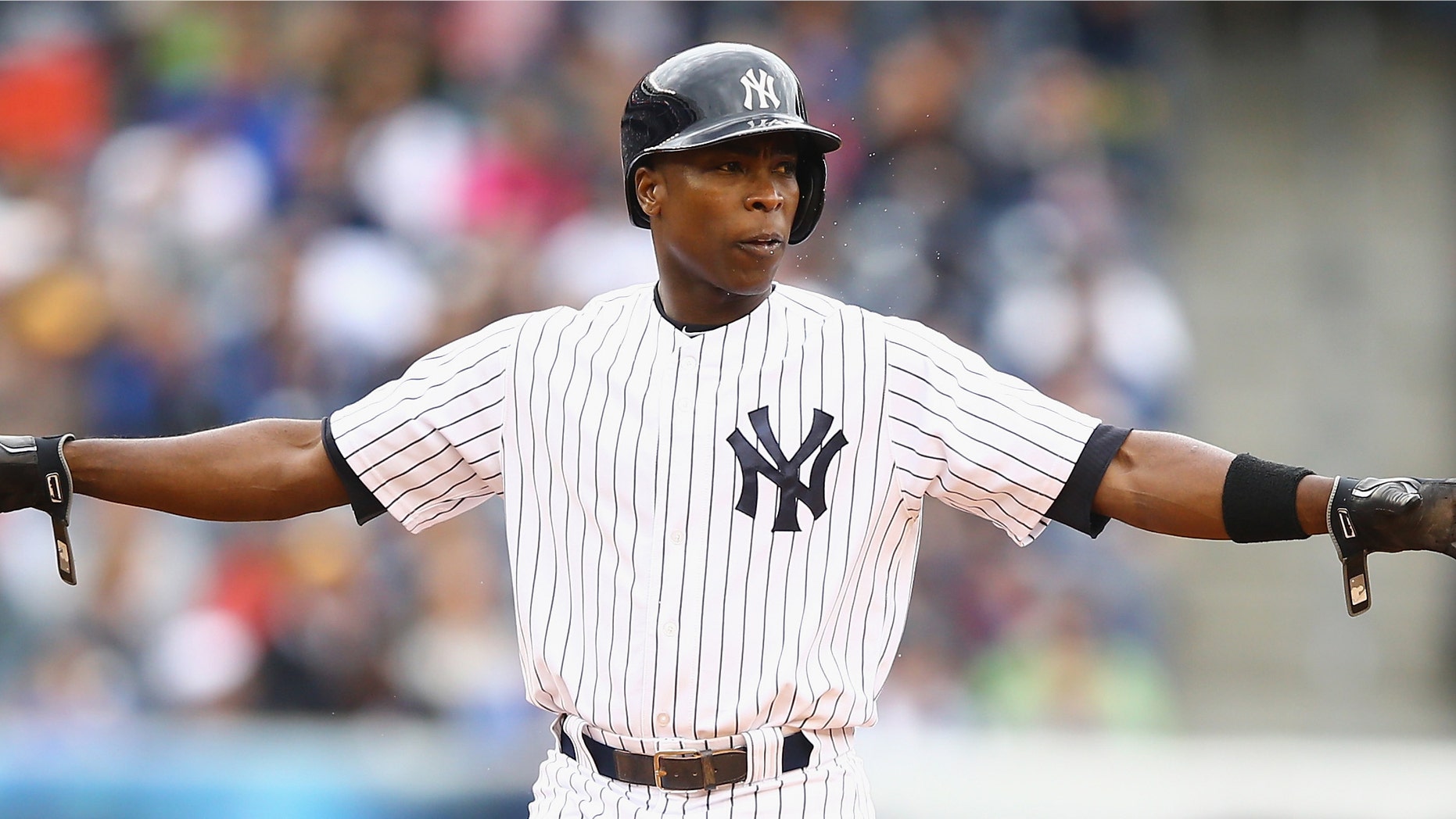 NEW YORK, NY - MAY 04: Alfonso Soriano #12 of the New York Yankees reacts after hitting a double against the Tampa Bay Rays during their game at Yankee Stadium on May 4, 2014 in the Bronx borough of New York City. (Photo by Al Bello/Getty Images)