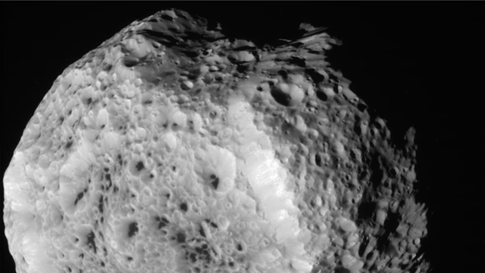 Aug. 25, 2011: NASA's Cassini spacecraft obtained this unprocessed image of Saturn's moon Hyperion during a close flyby.