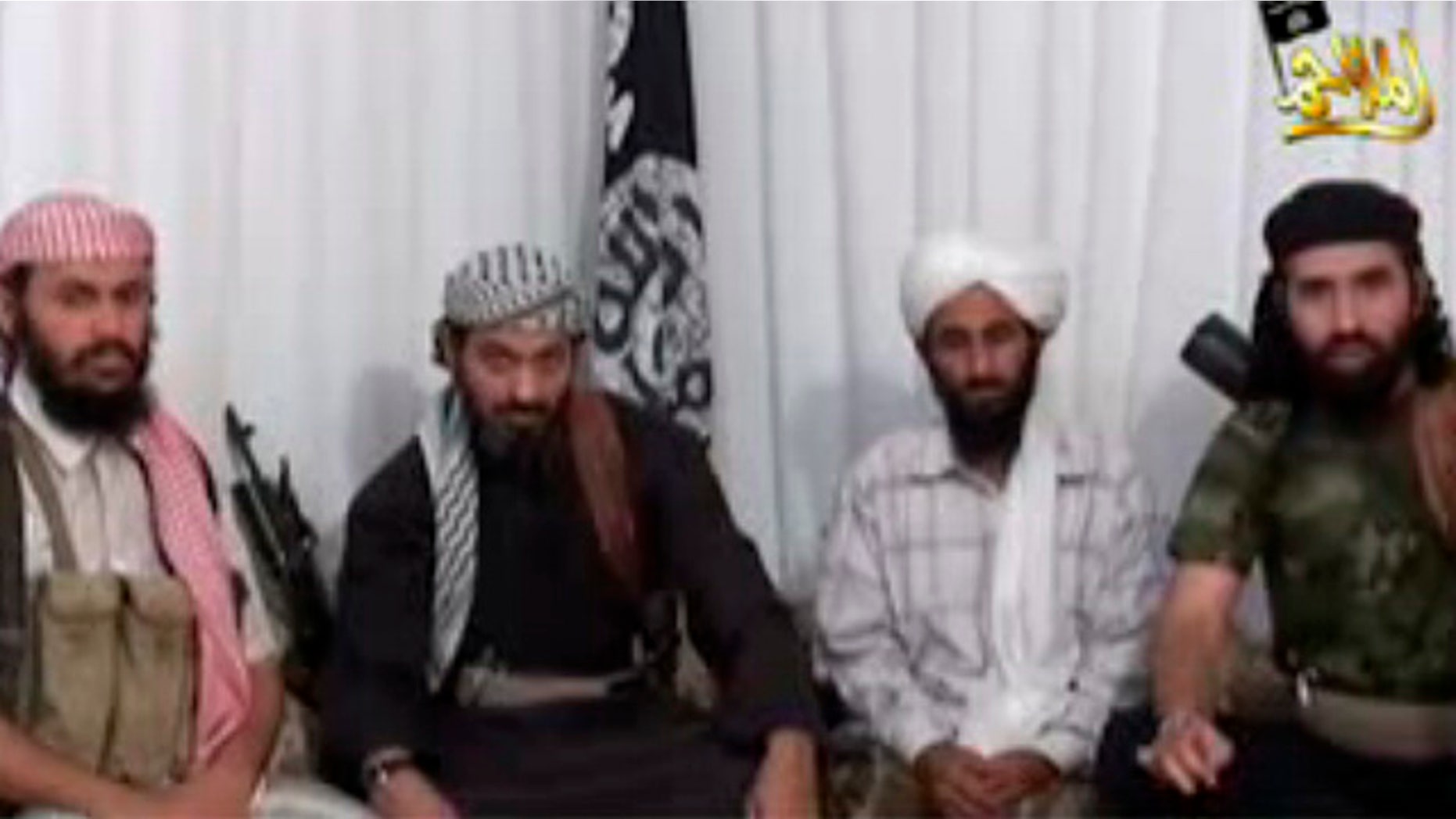 FILE: Jan. 24, 2009. The leader of Al Qaeda in Yemen, Nasser al-Wahaishi, second from right, is surrounded by deputies in an Internet video.
