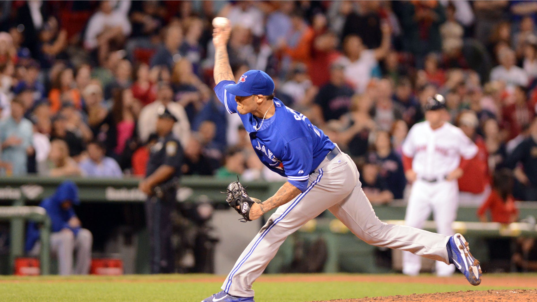 BOSTON, MA - SEPTEMBER 21: Sergio Santos #21 of the Toronto Blue Jays throws a pitch in the eighth inning against the Boston Red Sox at Fenway Park on September 21, 2013 in Boston, Massachusetts. The Blue Jays won the game 4-2. (Photo by Darren McCollester/Getty Images)