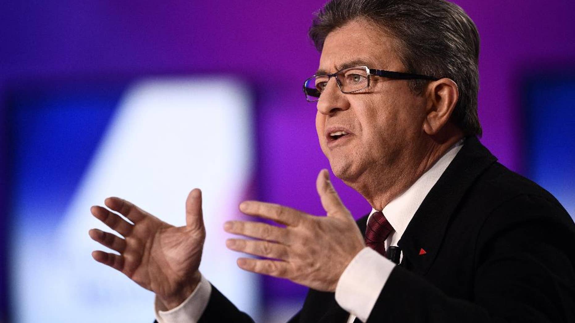 French Left party leader and candidate for the 2017 French presidential election Jean-Luc Melenchon arrives to attend a television debate at French national television France 2, in Saint Cloud, outside Paris, Thursday, April 20, 2017. The 11 men and women hoping to be France's next president are to appear on national television in a last appeal to voters in a nail-biting election campaign. (Martin Bureau/Pool via AP)