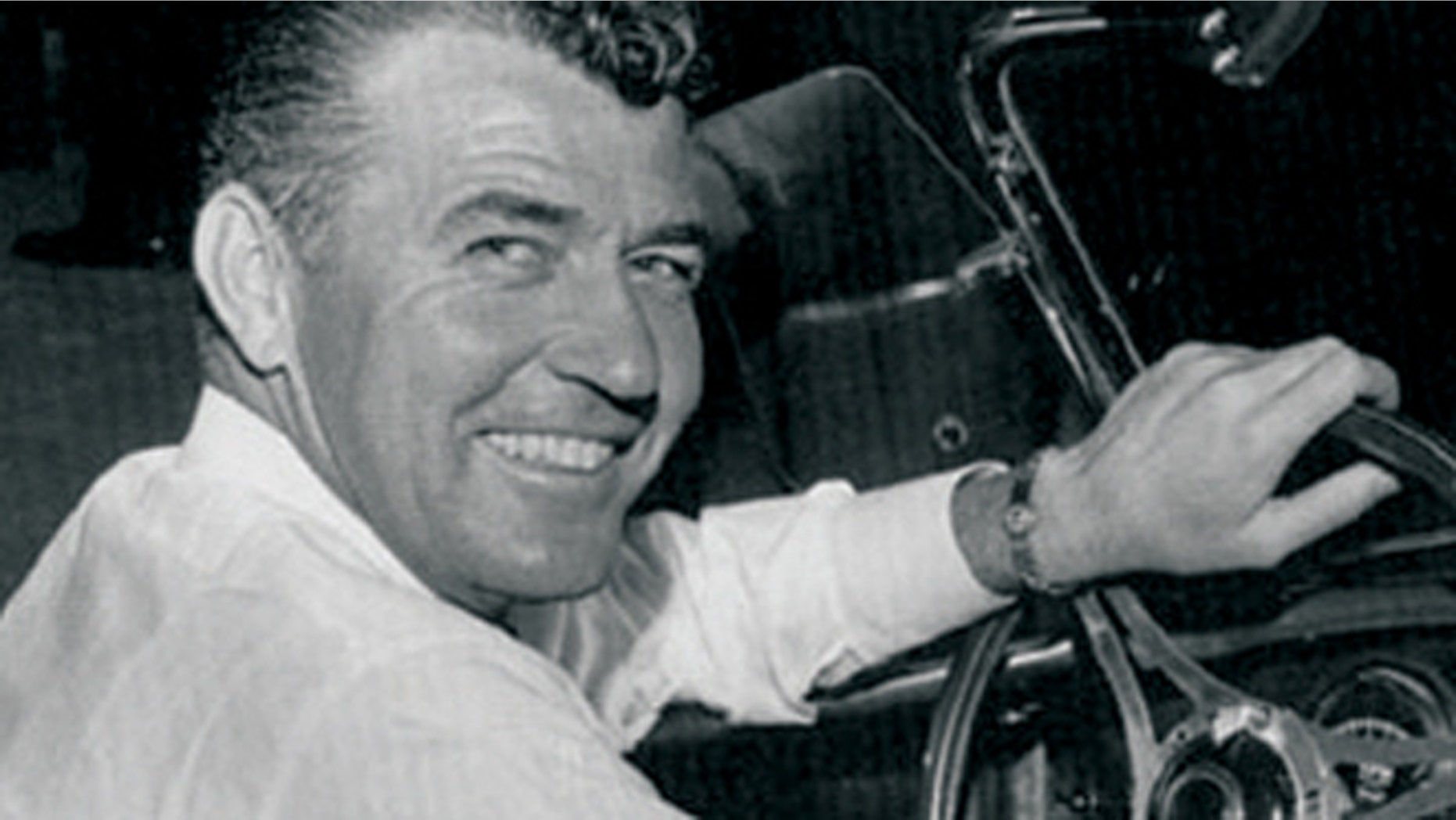 Carroll Shelby at the wheel of the original Shelby Cobra