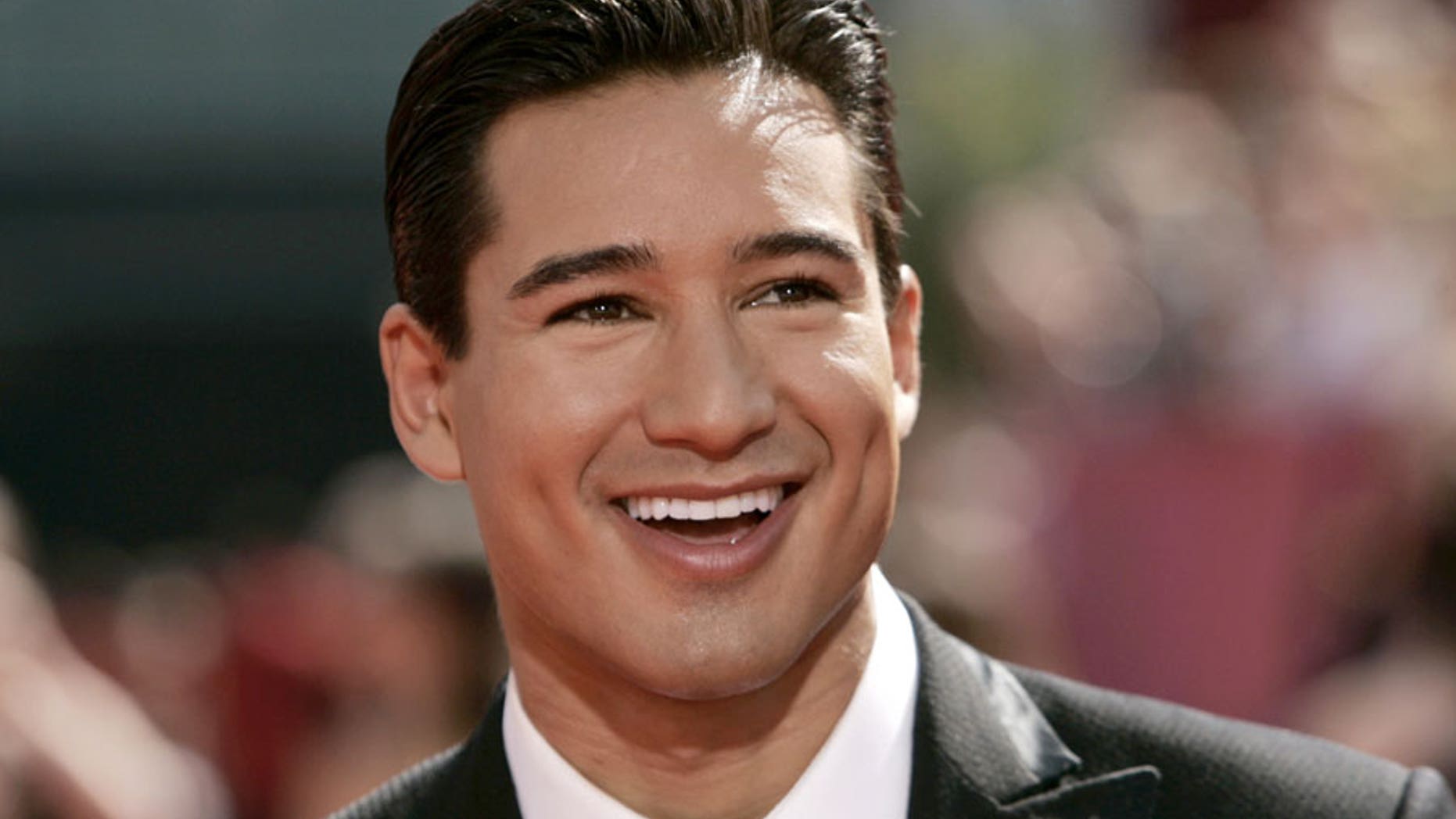 Mario Lopez was baptized in the same river as Jesus during his "bucket-list" trip to the Holy Land.