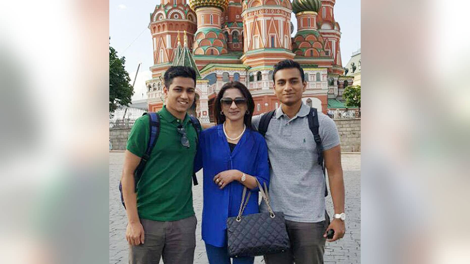 This May 26, 2016, photo, provided by the Hossain Family shows Faraaz Hossain, left, mother, Simeen, center, and brother, Zaraif, right, in Moscow, Russia. When Faraaz Hossain’s family received his body after the deadly siege at the Holey Artisan Bakery in Dhaka, Bangladesh, on July 2, 2016, they noticed the palm of his right hand had been sliced clean through. The wound suggested the 20-year-old Faraaz, the family’s beloved youngest child, had grabbed the attacker’s sword and tried to fight back. (Hossain Family photo via AP)