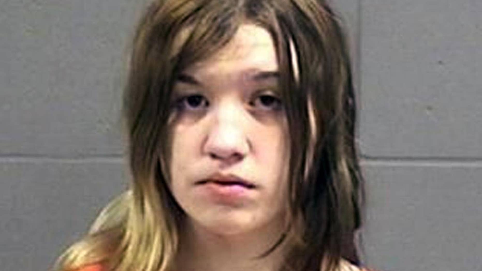 This photo provided Friday, April 24, 2014 by the Oneida County, Wisconsin, Sheriff’s Office shows Ashlee Martinson, 17. Martinson is is charged with fatally stabbing her mother Jennifer Ayers, 40, and shooting her stepfather Thomas Ayers, 37, on March 8 at the family's home in the Town of Piehl, Wis. (Oneida County Sheriff’s Office via AP)