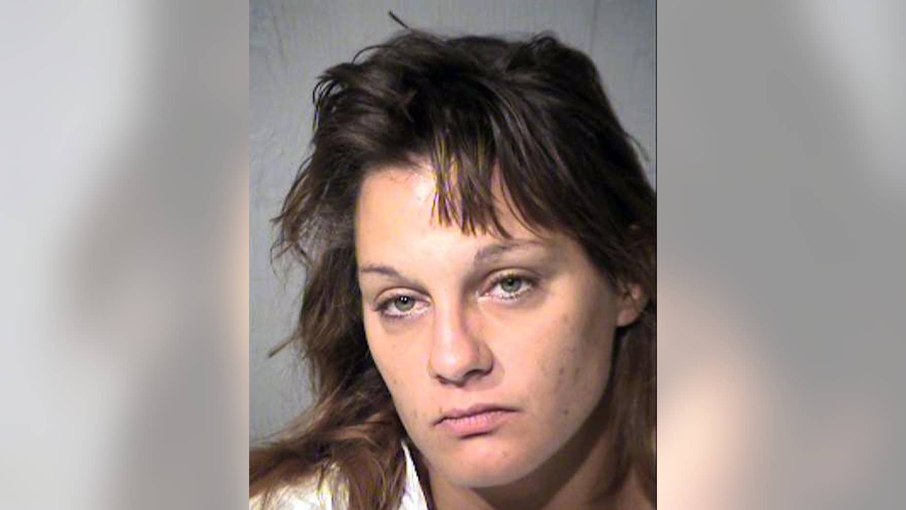 This undated photo provided by the Maricopa County, Ariz., Sheriff's Department shows Jenna Keller. Phoenix police allege Keller was the intoxicated driver who ran over her boyfriend and another man, killing the other man, as the two men fought in a Phoenix parking lot Thursday, Oct. 20, 2016. Police said the fight was related to traffic but wouldn't elaborate. Keller was jailed on suspicion of second-degree murder and aggravated assault. (Maricopa County Sheriff's Department via AP)