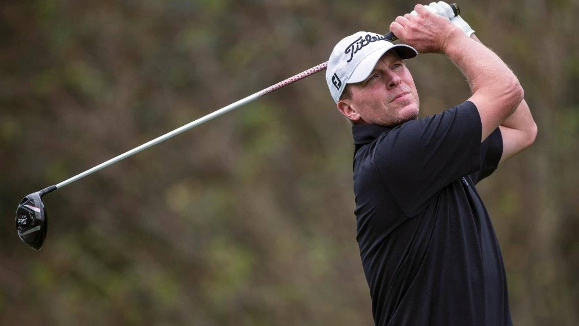 Steve Stricker tees off from the fourth hole during the final round of the Hero World Challenge golf tournament on Sunday, Dec. 7, 2014, in Windermere, Fla. (AP Photo/Willie J. Allen Jr.)