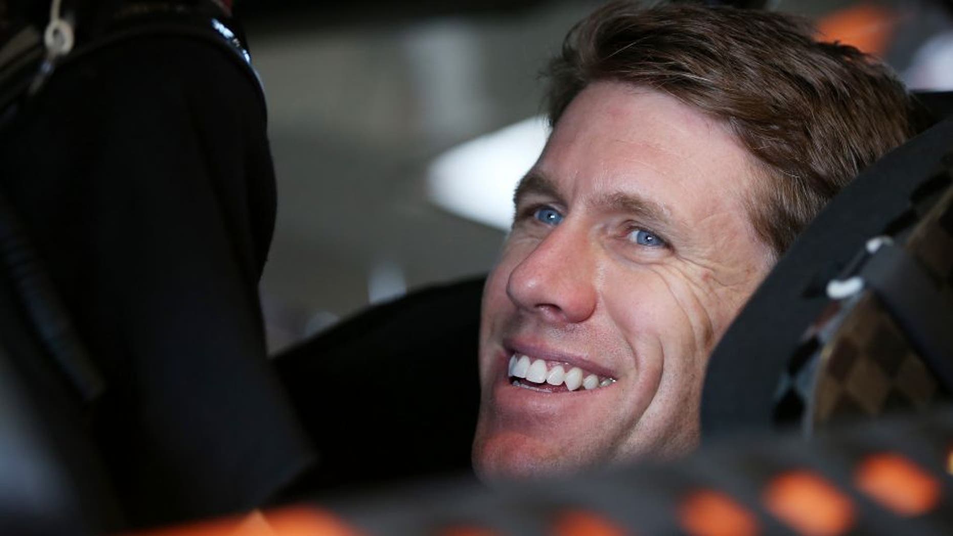 HOMESTEAD, FL - NOVEMBER 18: Carl Edwards, driver of the #19 ARRIS Toyota, sits in his car in the garage area during practice for the NASCAR Sprint Cup Series Ford EcoBoost 400 at Homestead-Miami Speedway on November 18, 2016 in Homestead, Florida. (Photo by Sean Gardner/NASCAR via Getty Images)