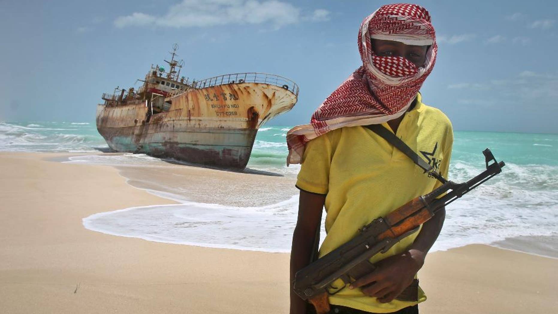 A masked Somali pirate in 2012.