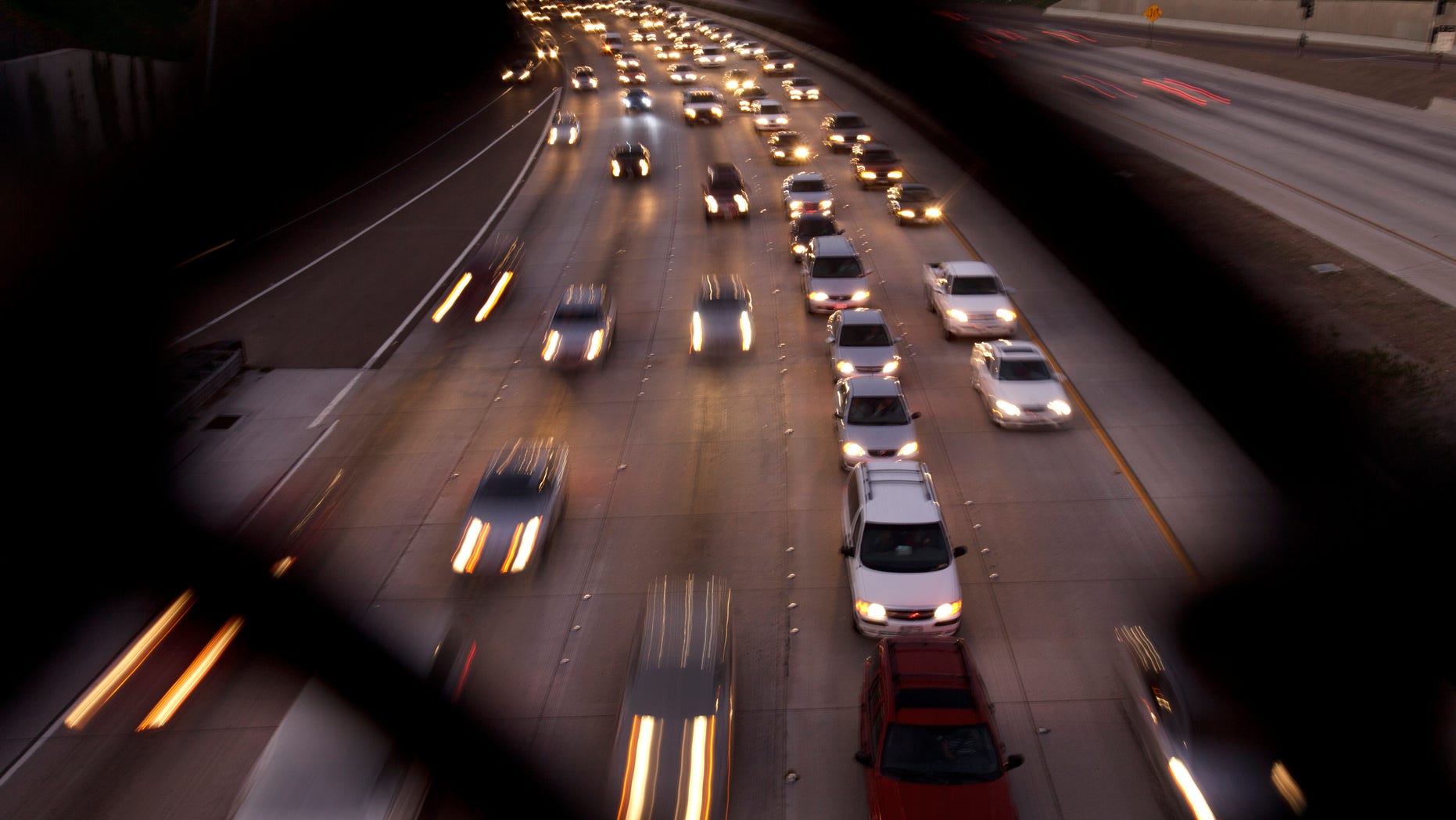 Cars fill the highway, Tuesday, Nov. 22, 2011, in San Diego. About 42.5 million people are expected to travel over Thanksgiving, the highest number since the start of the recession, according to a recent study. (AP Photo/Gregory Bull)
