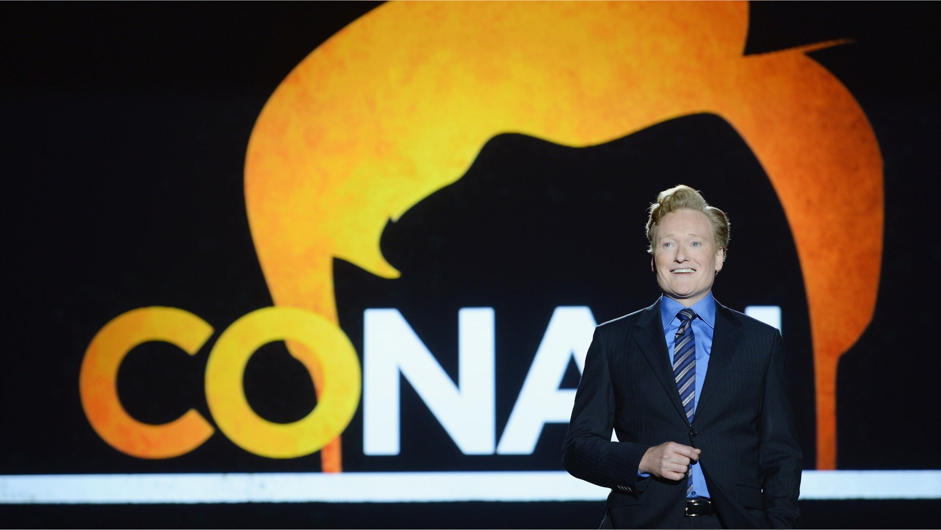 NEW YORK, NY - MAY 14: Conan O'Brien speaks onstage at the TBS / TNT Upfront 2014 at The Theater at Madison Square Garden on May 14, 2014 in New York City. 24674_002_1242.JPG (Photo by Dimitrios Kambouris/Getty Images for Turner)