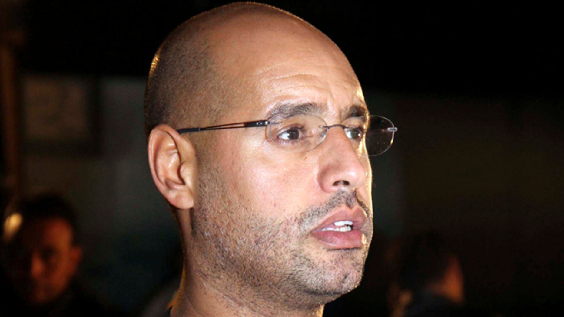 Feb. 22: Saif al-Islam Qaddafi, son of Libyan leader Muammar al-Qaddafi, waits before a press conference in Tripoli, Libya.