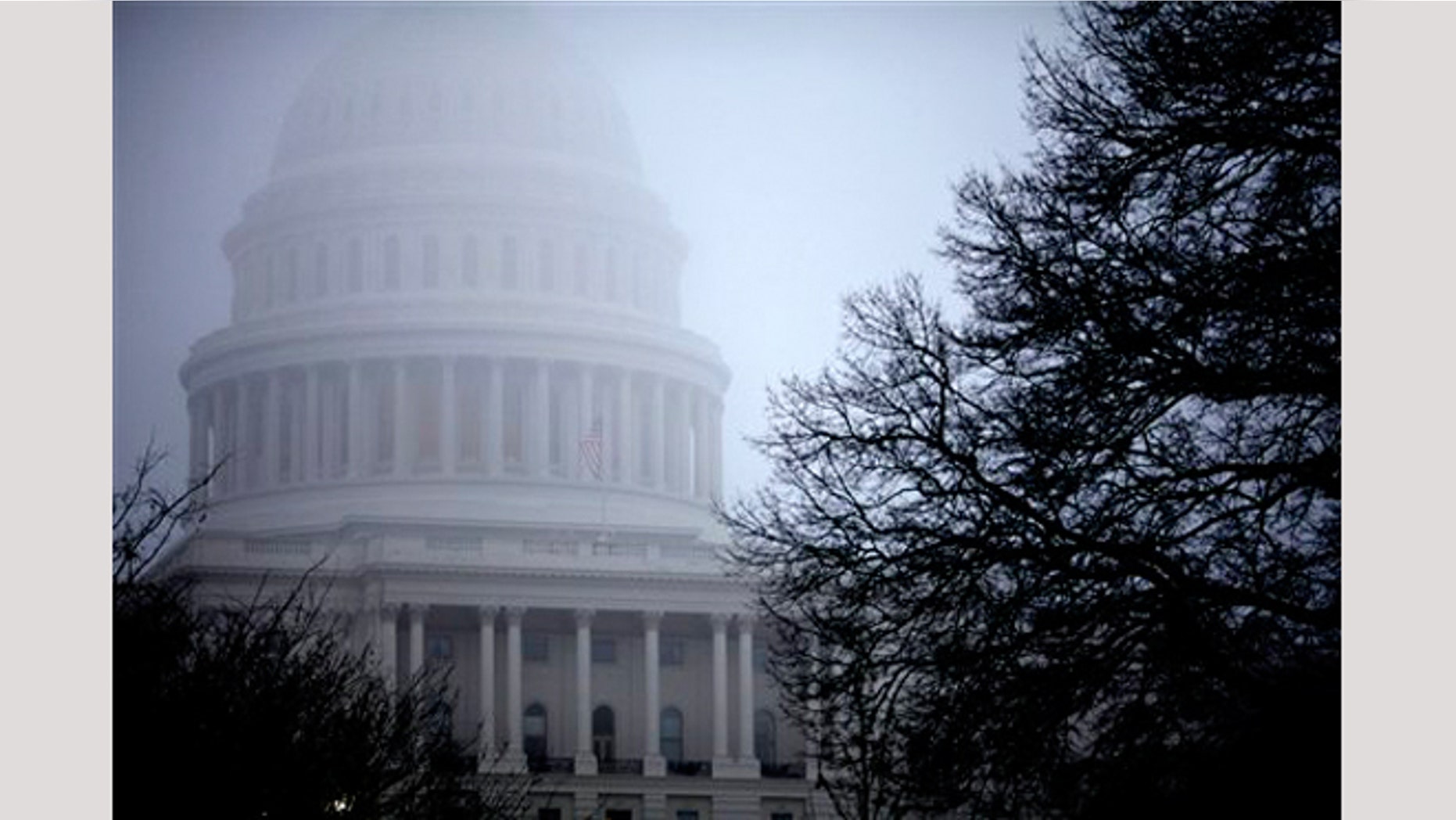 FILE - In this Dec. 10, 2012 file photo, fog obscures the Capitol dome on Capitol Hill in Washington.