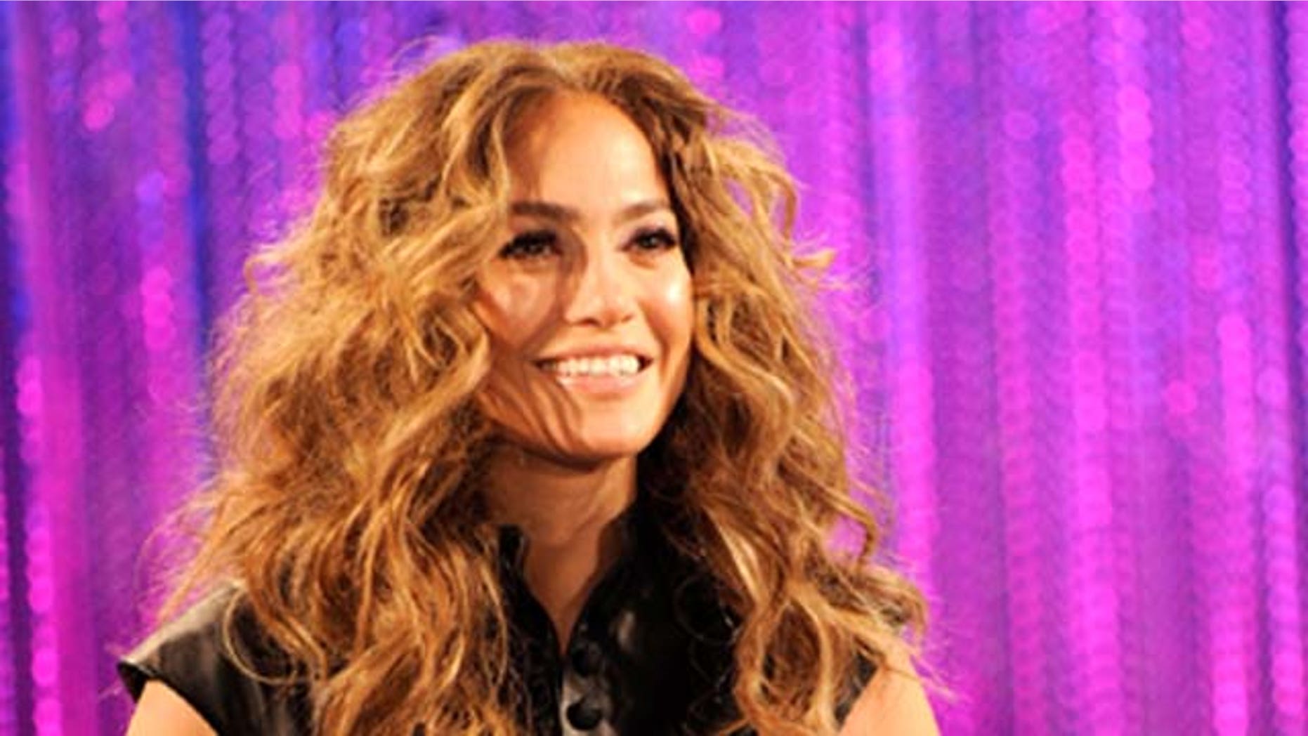 MAY 3, 2011: Jennifer Lopez signs CD covers for fans to celebrate her new album 'LOVE?' held at the Hard Rock Cafe Hollywood in Hollywood, Calif.