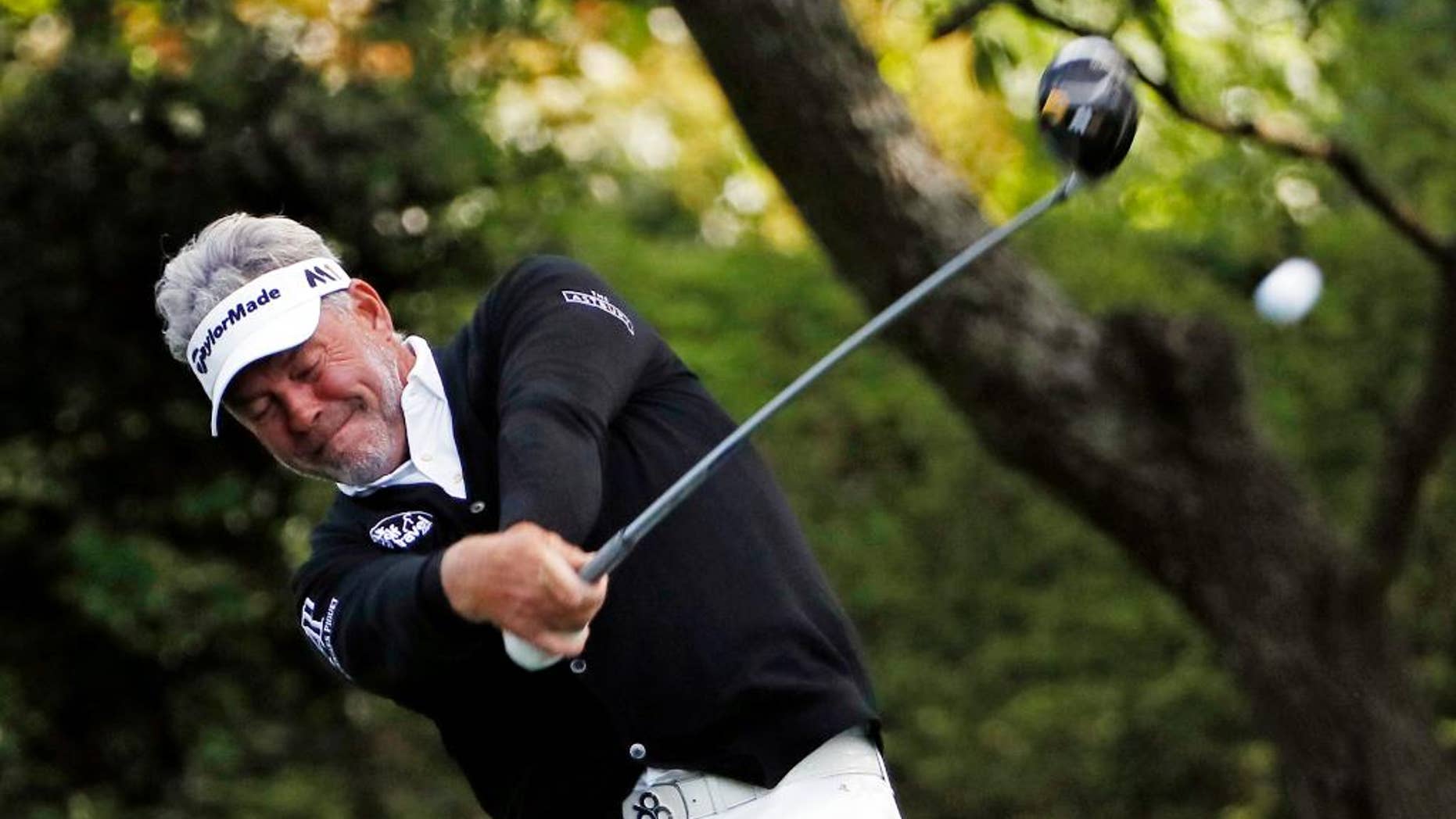 Darren Clarke, of Northern Ireland, tees off on the second hole during the second round of the Masters golf tournament Friday, April 8, 2016, in Augusta, Ga. (AP Photo/David J. Phillip)