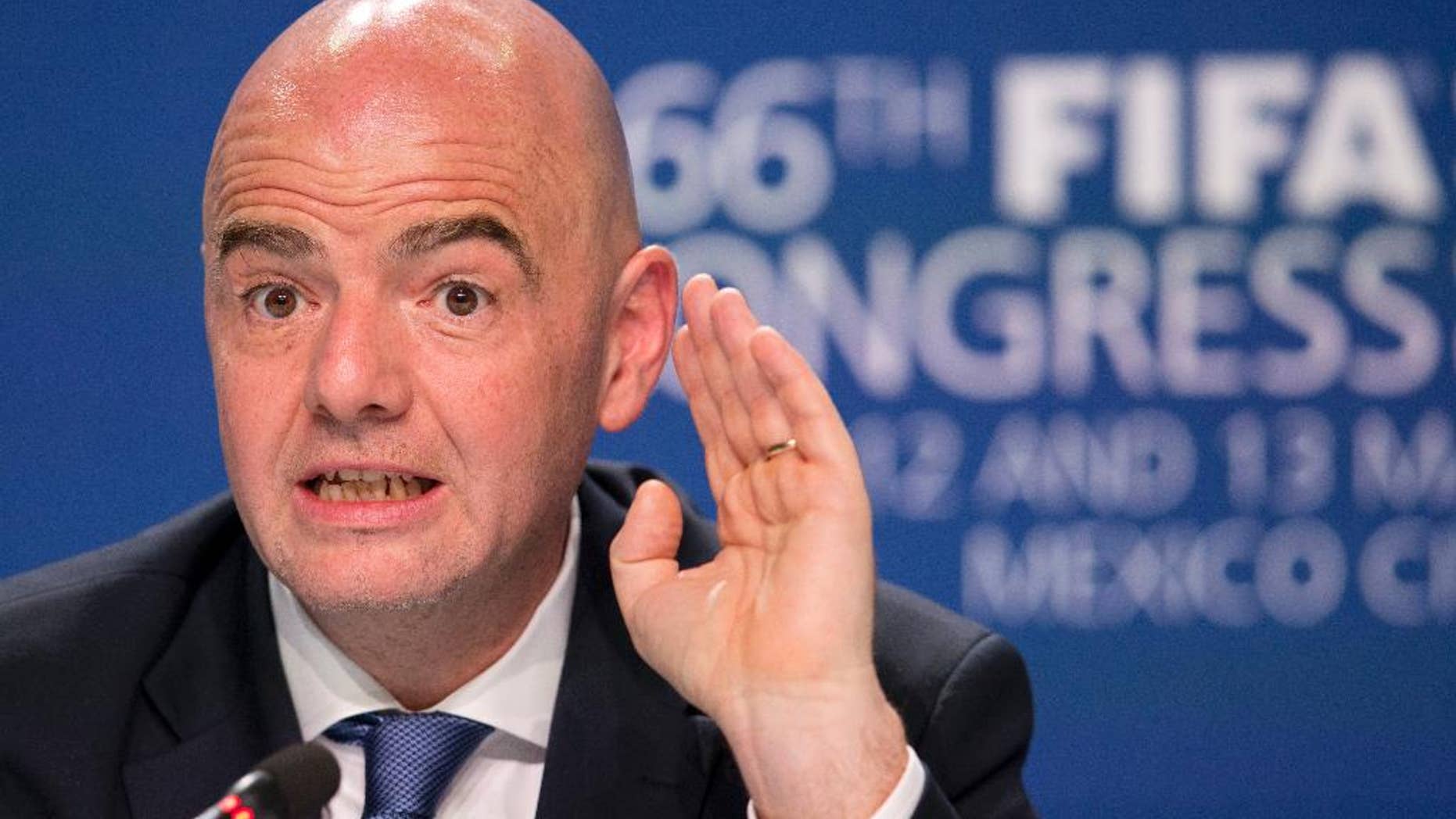 FIFA President Gianni Infantino gives a press conference following the closing of the 66th FIFA Congress in Mexico City, Friday, May 13, 2016. FIFA's corruption crisis was declared to be over by Infantino on Friday as the scandal-battered governing body broke new ground by appointing a Senegalese United Nations official as its first female and first non-European secretary general. (AP Photo/Rebecca Blackwell)