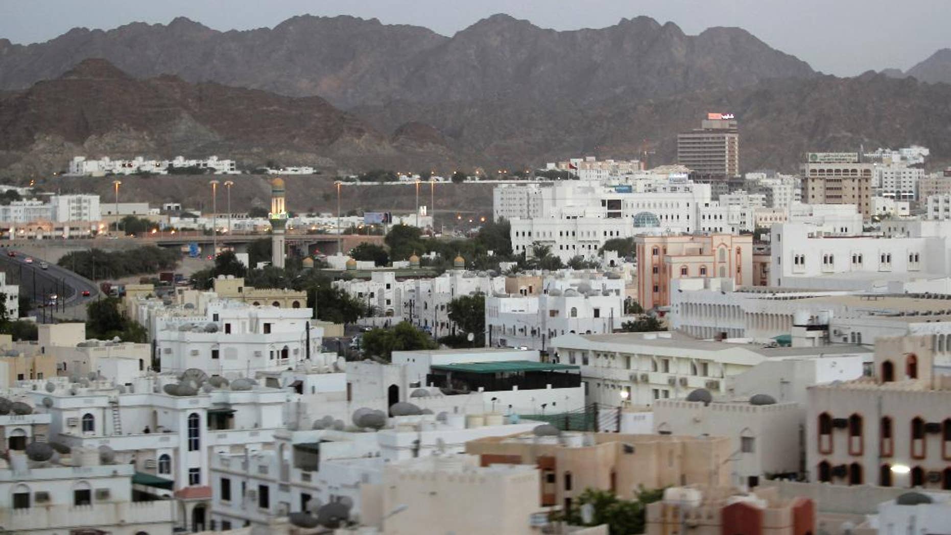 FILE -- In this Sept. 15, 2010 file photo shows a general view of the city, in Muscat, Oman. A new report released Wednesday, July 13, 2016 by Human Rights Watch alleges that foreign maids working in Oman face abuse and conditions that near slavery. The report, based on interviews its researchers conducted with 59 female migrant workers in the sultanate, said some recounted being beaten, verbally abused, denied fair pay and working as much as 20-hour days. (AP Photo/Kamran Jebreili, File)