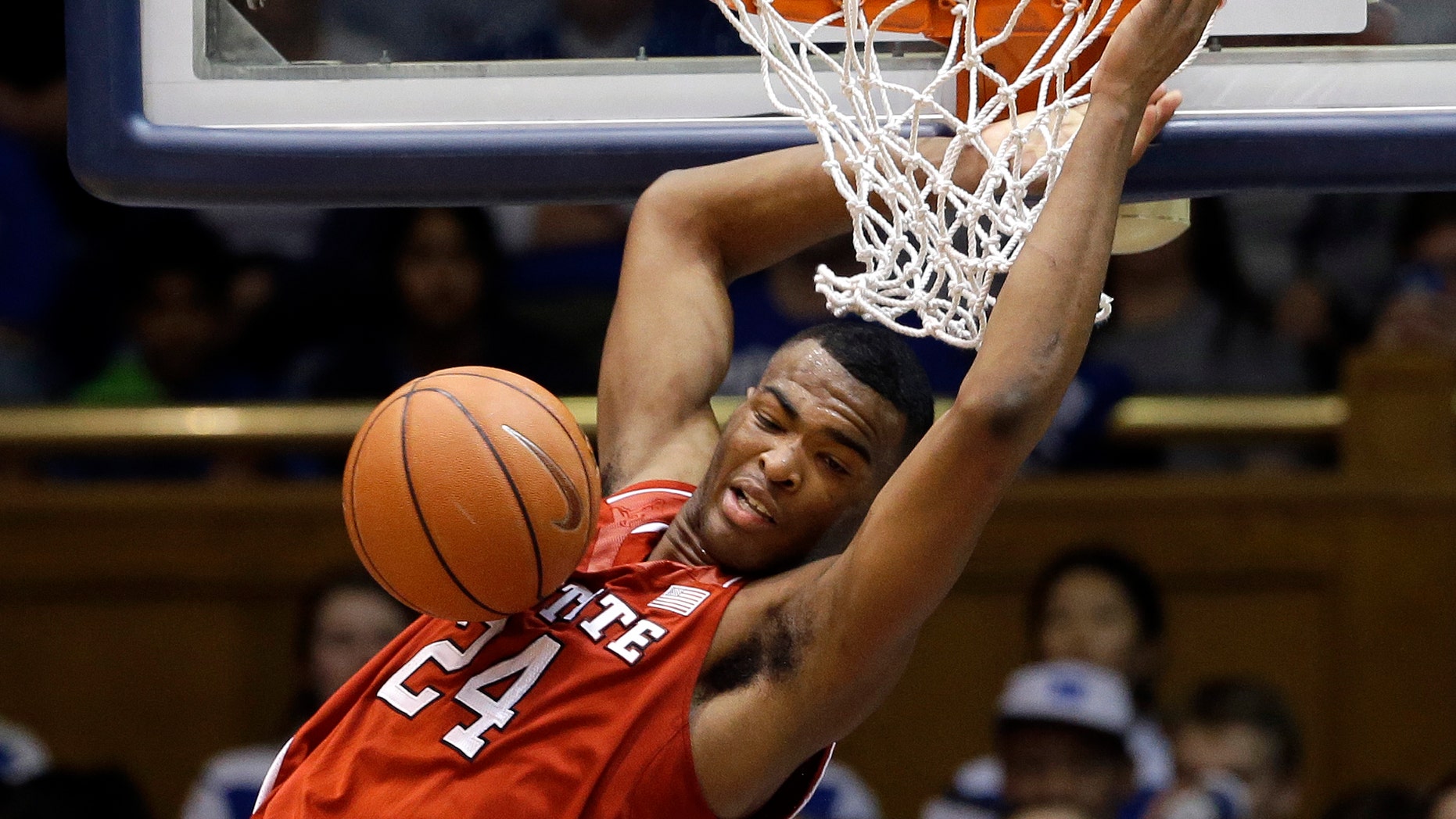 North Carolina State's T.J. Warren (24) dunks against Duke during the second half of an NCAA college basketball game in Durham, N.C., Saturday, Jan. 18, 2014. Duke won 95-60. (AP Photo/Gerry Broome)