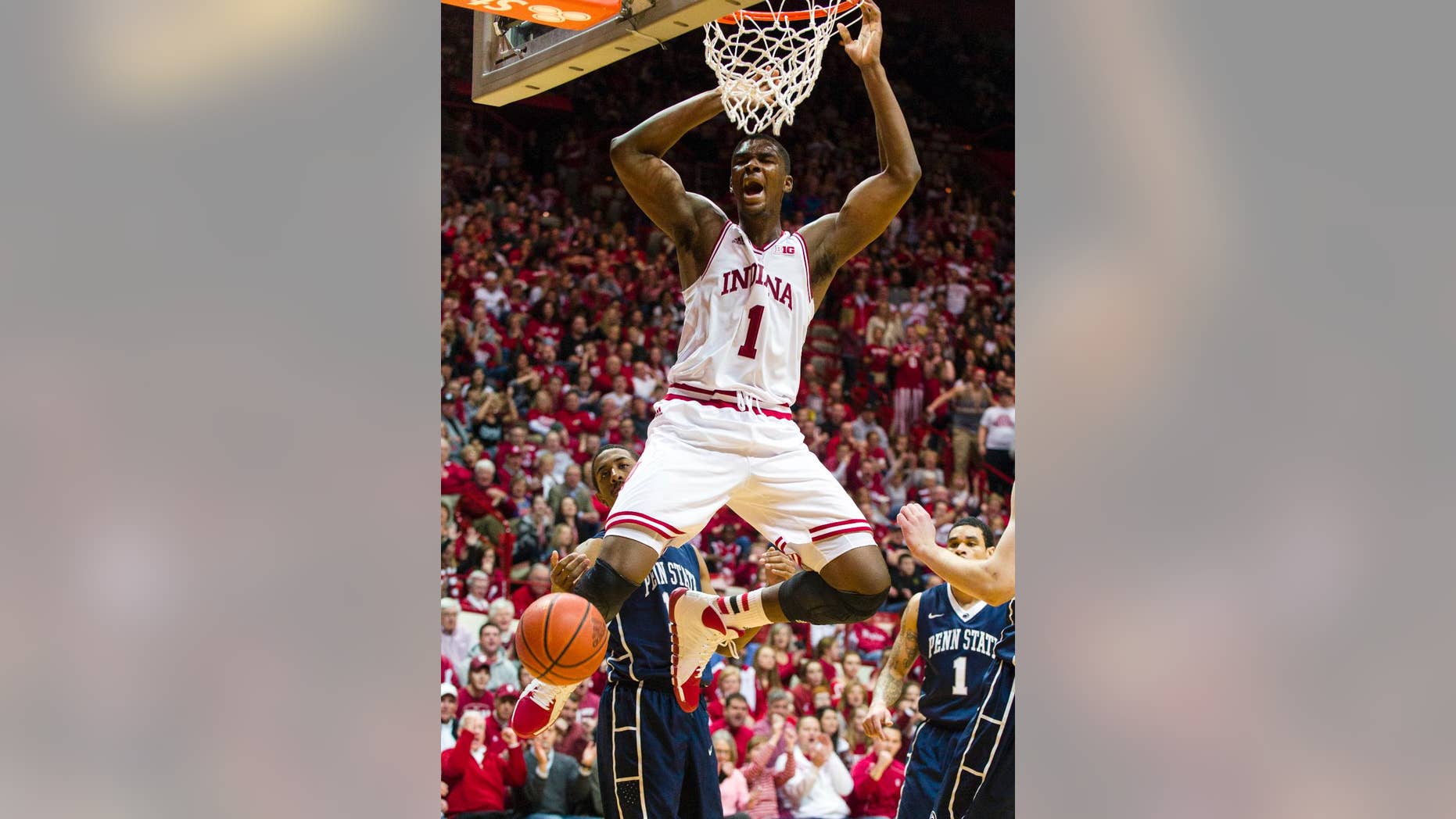 FILE - In this Feb. 12, 2014 file photo, Indiana's Noah Vonleh (1) celebrates after a slam dunk in the second half of an NCAA college basketball game against Penn State, in Bloomington, Ind. Vonleh is a possible pick in the 2014 NBA Draft, Thursday, June 26, 2014 in New York. (AP Photo/Doug McSchooler, File)