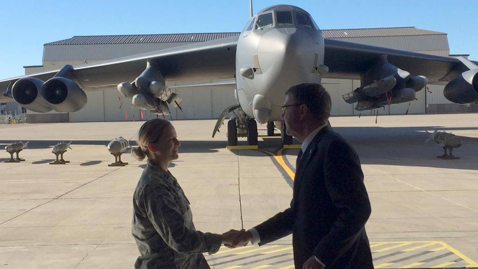 Defense Secretary Ash Carter greets airmen at Minot Air Force Base, N.D., Monday, Sept. 26, 2016, after giving a speech on nuclear weapons. Carter says the Pentagon is committed to correcting what he calls decades of shortchanging its nuclear forces. Carter spoke Monday at a nuclear missile and bomber base in Minot. He says $108 billion is earmarked for sustaining and improving the forces over the next five years. (AP Photo/Robert Burns)