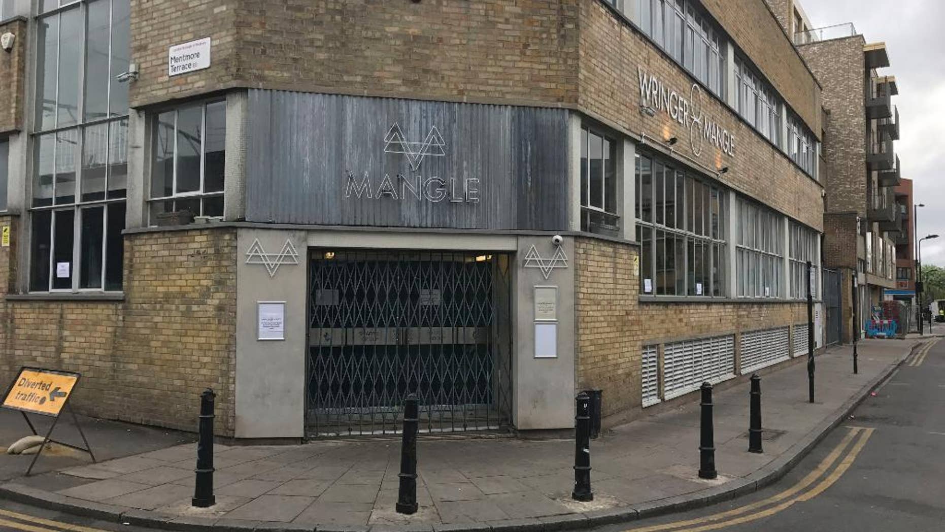 General view of the Mangle nightclub in Dalston, east London on Monday April 17, 2017. London police are investigating an acid attack at a London club that led to a mass evacuation with 12 people injured. Police said Monday April 17, 2017 that 12 people were treated at hospitals for burns. None of the injuries were said to be life-threatening. (Jack Hard/PA via AP)