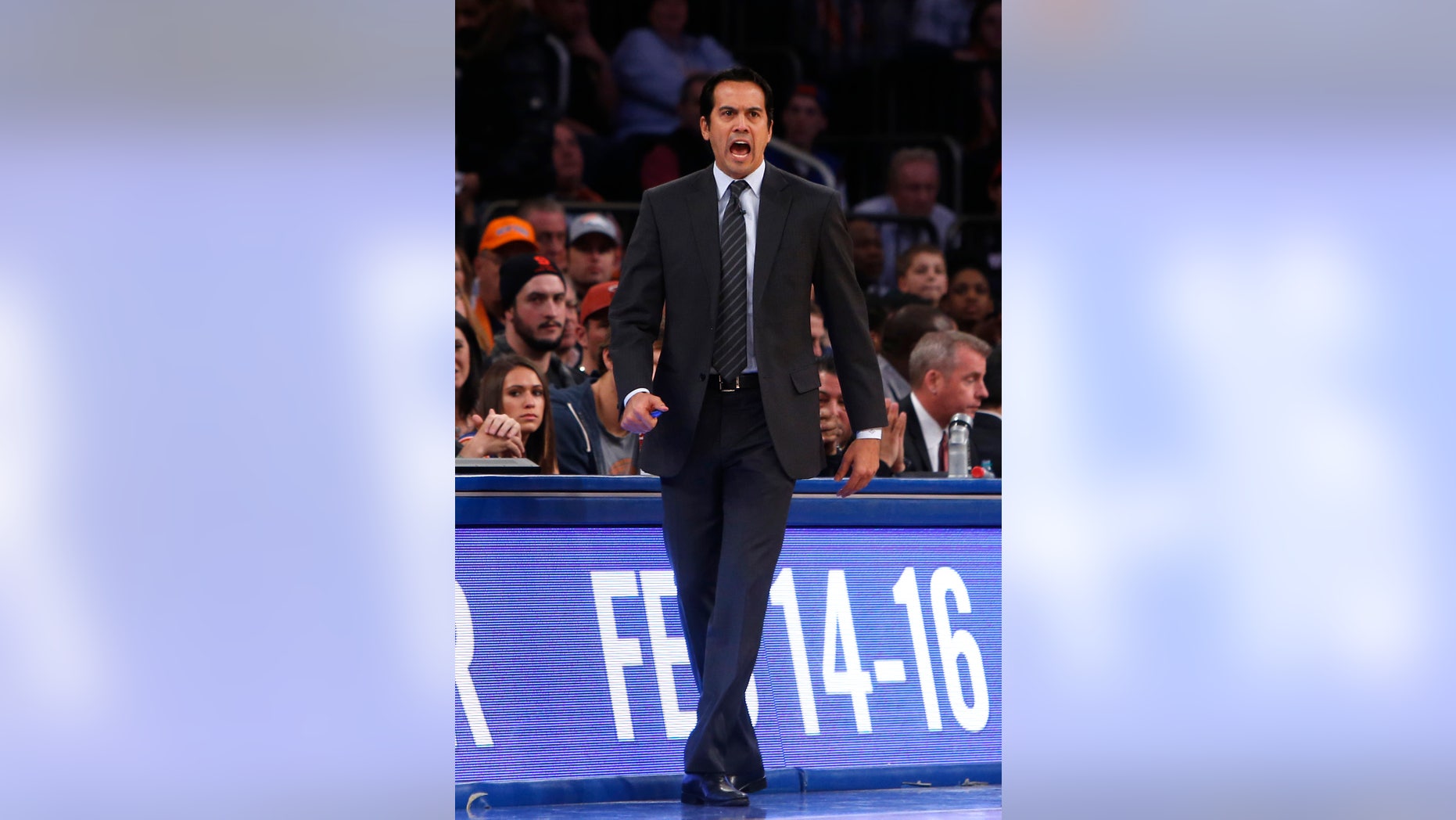 Miami Heat coach Erik Spoelstra calls to his team during the first half of an NBA basketball game against the New York Knicks on Saturday, Feb. 1, 2014, in New York. Miami won 106-91. (AP Photo/Jason DeCrow)