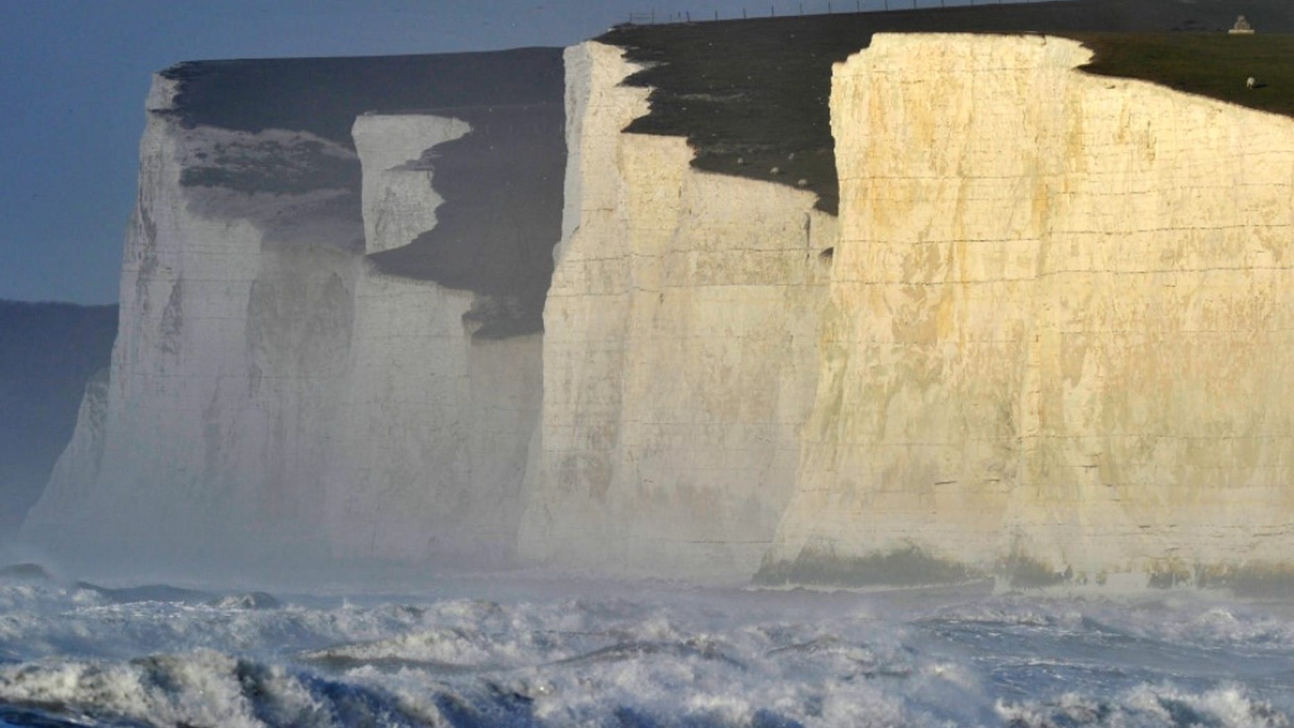 A 23-year-old exchange student from South Korea fell to her death while posing for a photo on the Seven Sisters cliffs.
