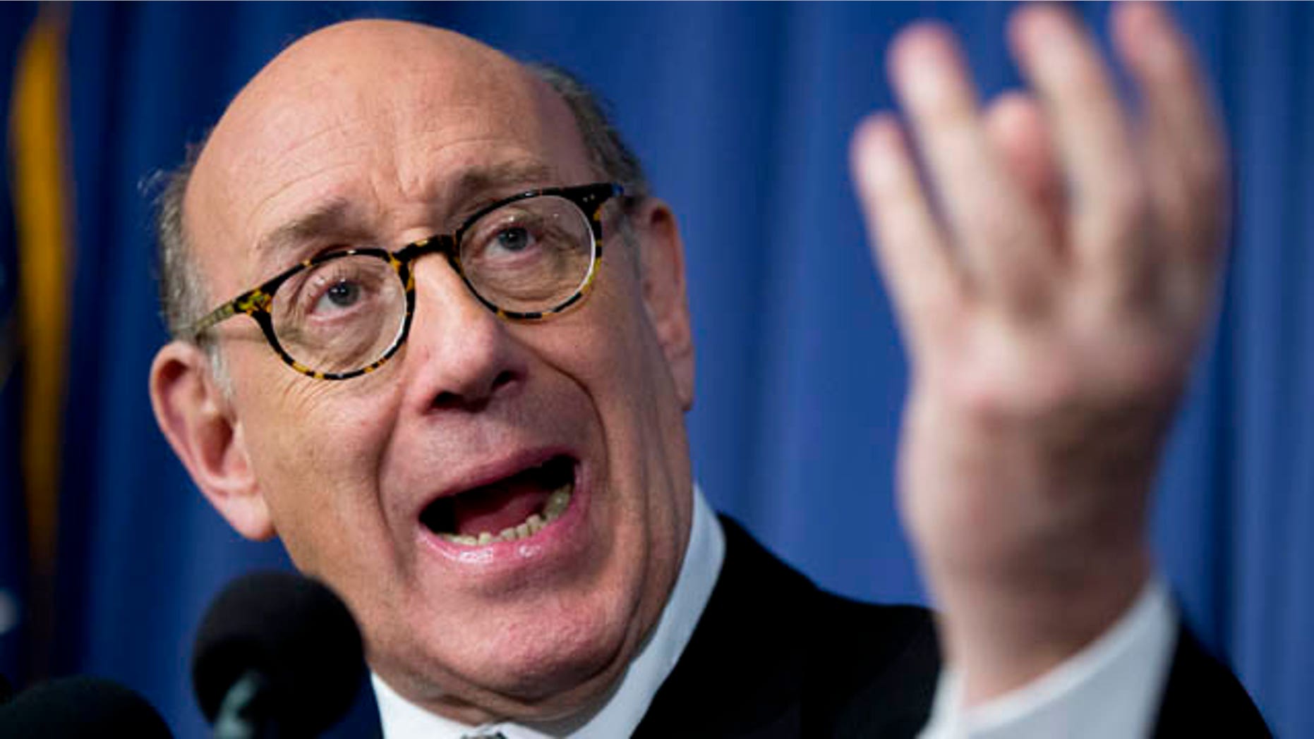 FILE - In this Monday, June 30, 2014, file photo, Kenneth Feinberg, the independent claims administrator for the General Motors Ignition Compensation Program, announces the details of the program during a news conference at the National Press Club in Washington. (AP Photo/Manuel Balce Ceneta)